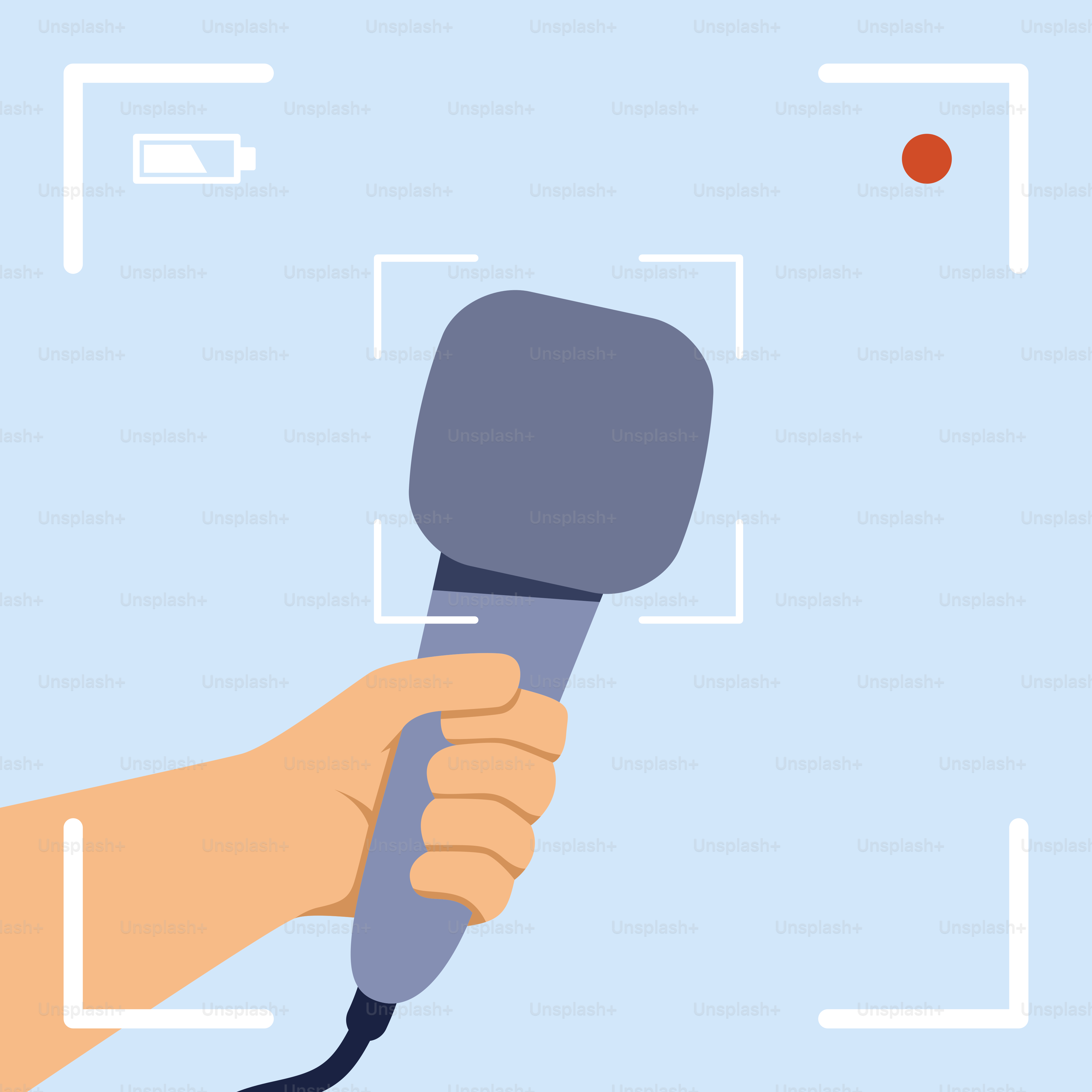 A hand holding a microphone in front of a blue background