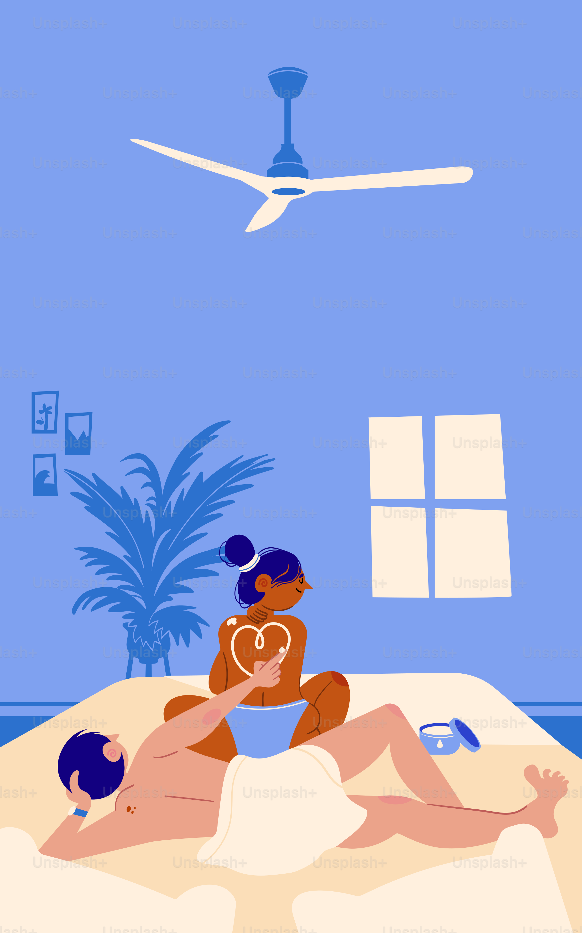 A man and a woman laying on a bed