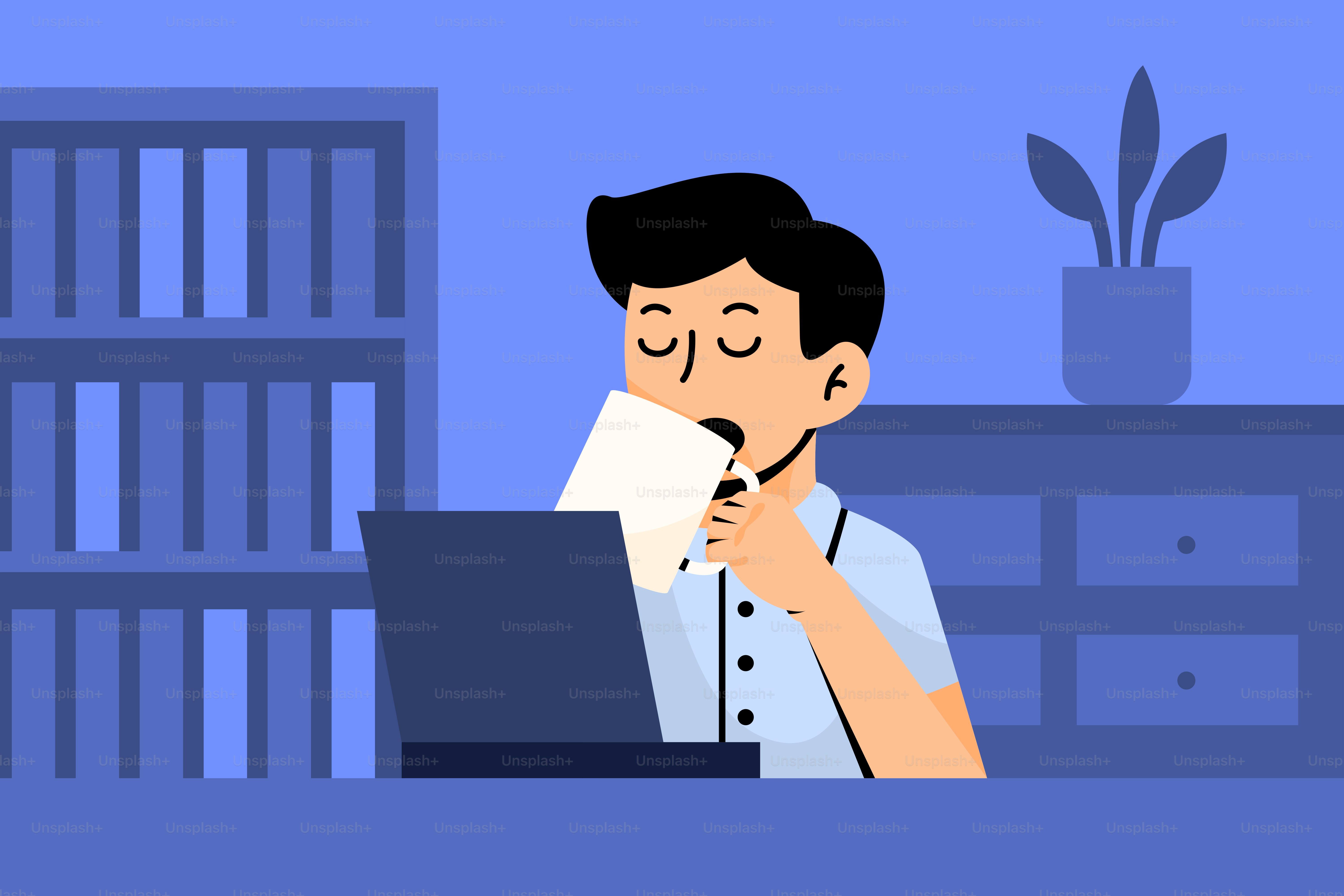 A man sitting in front of a laptop computer