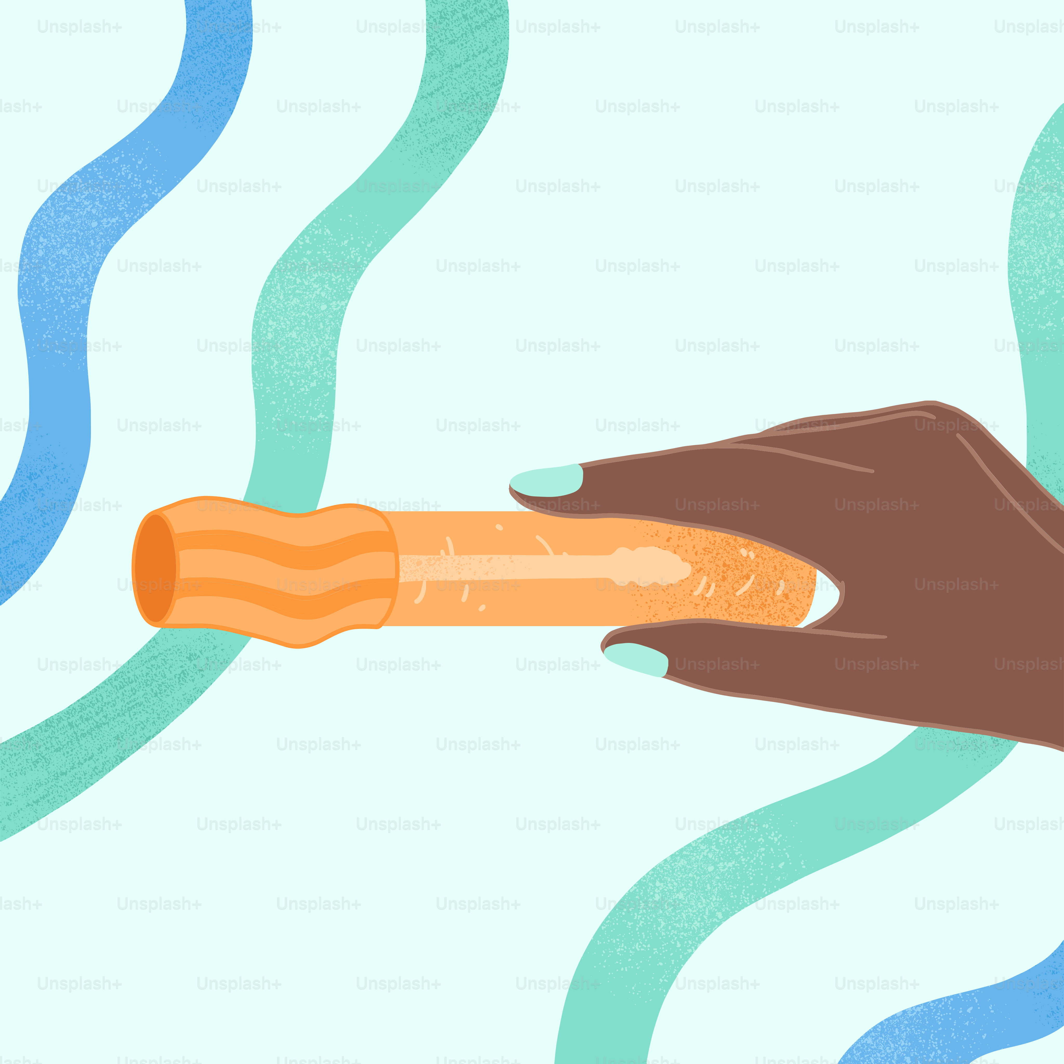 A hand holding a hot dog in a bun