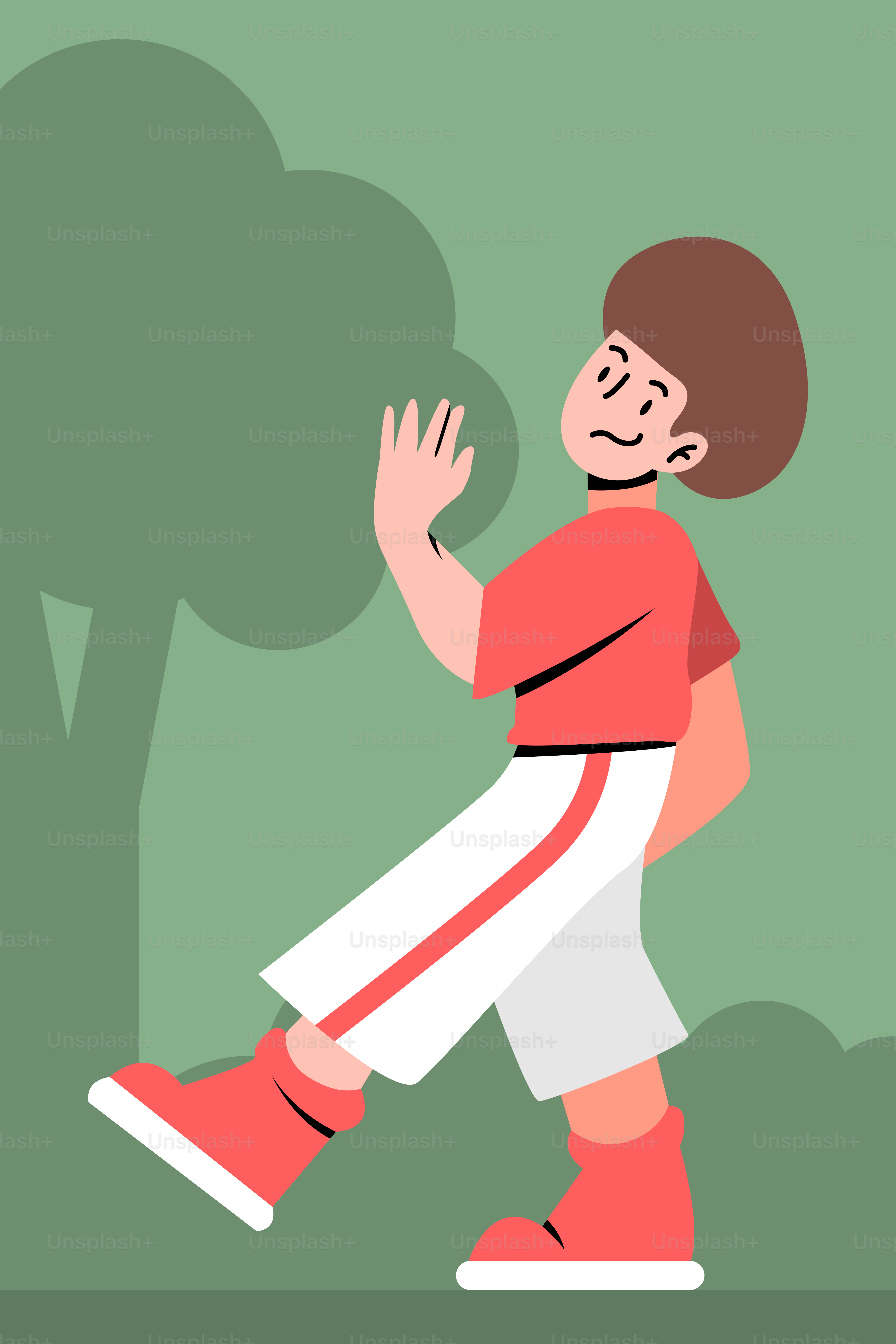 A boy walking in the park with his hands in the air