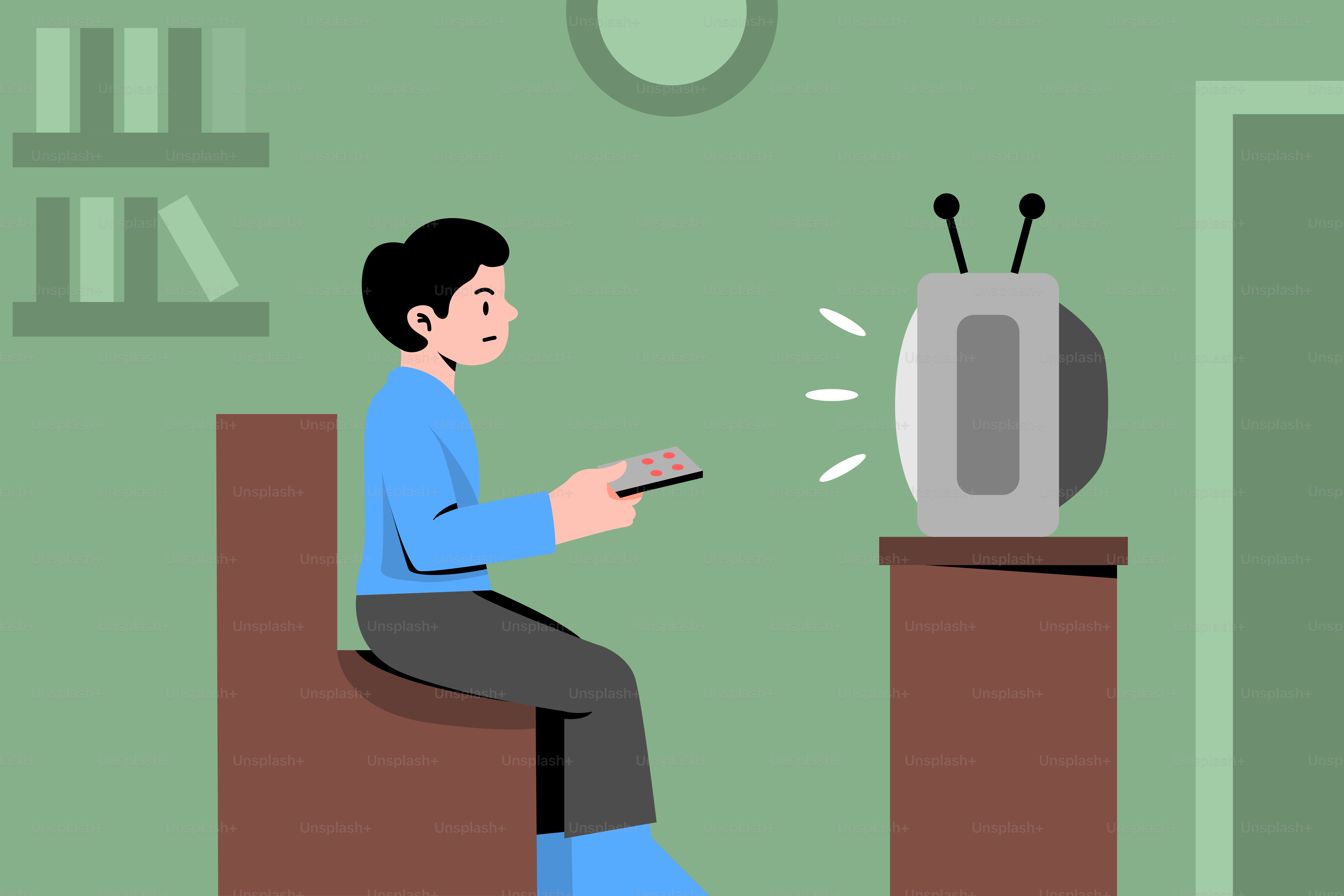 A man sitting on a chair looking at his cell phone