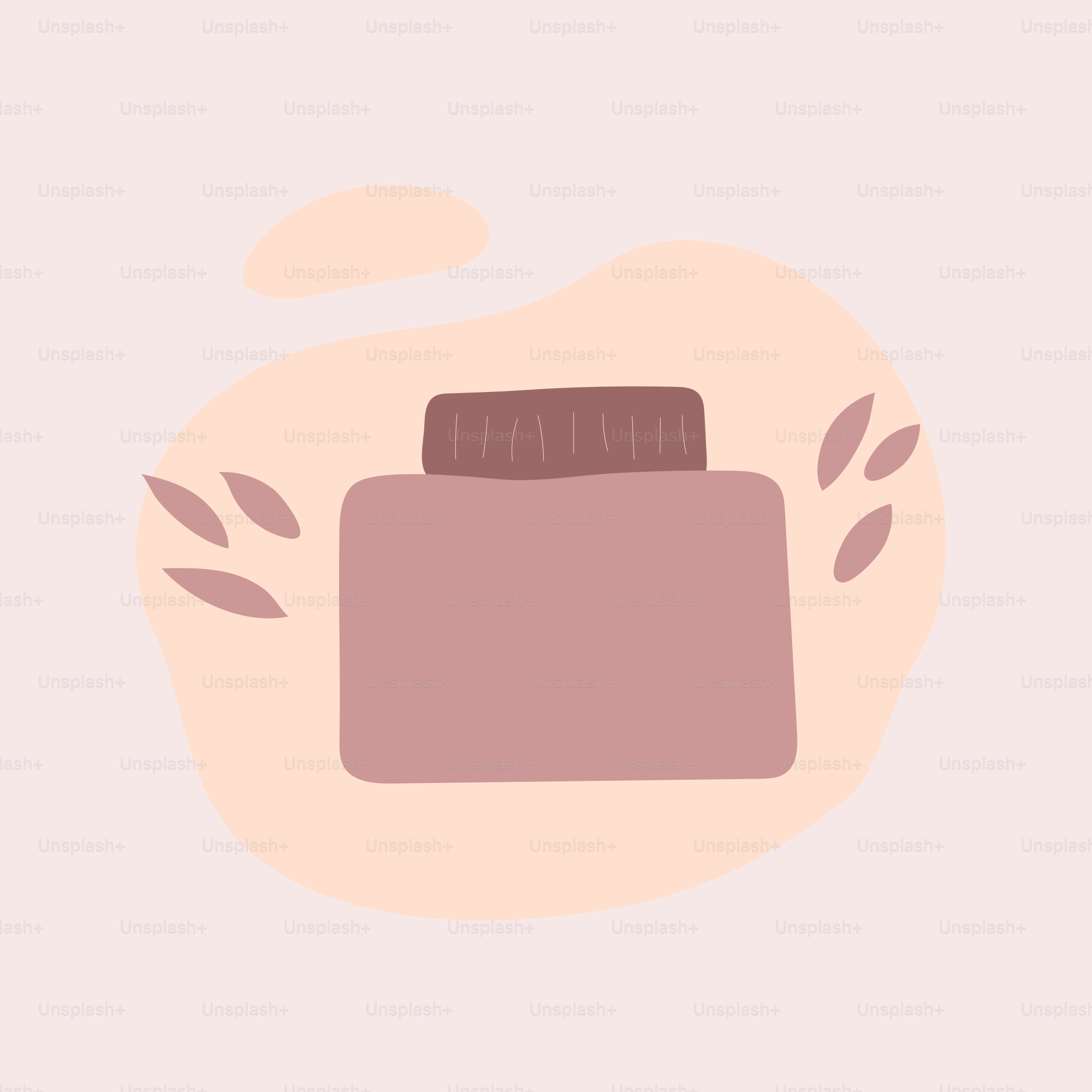 A bottle of liquid with leaves around it