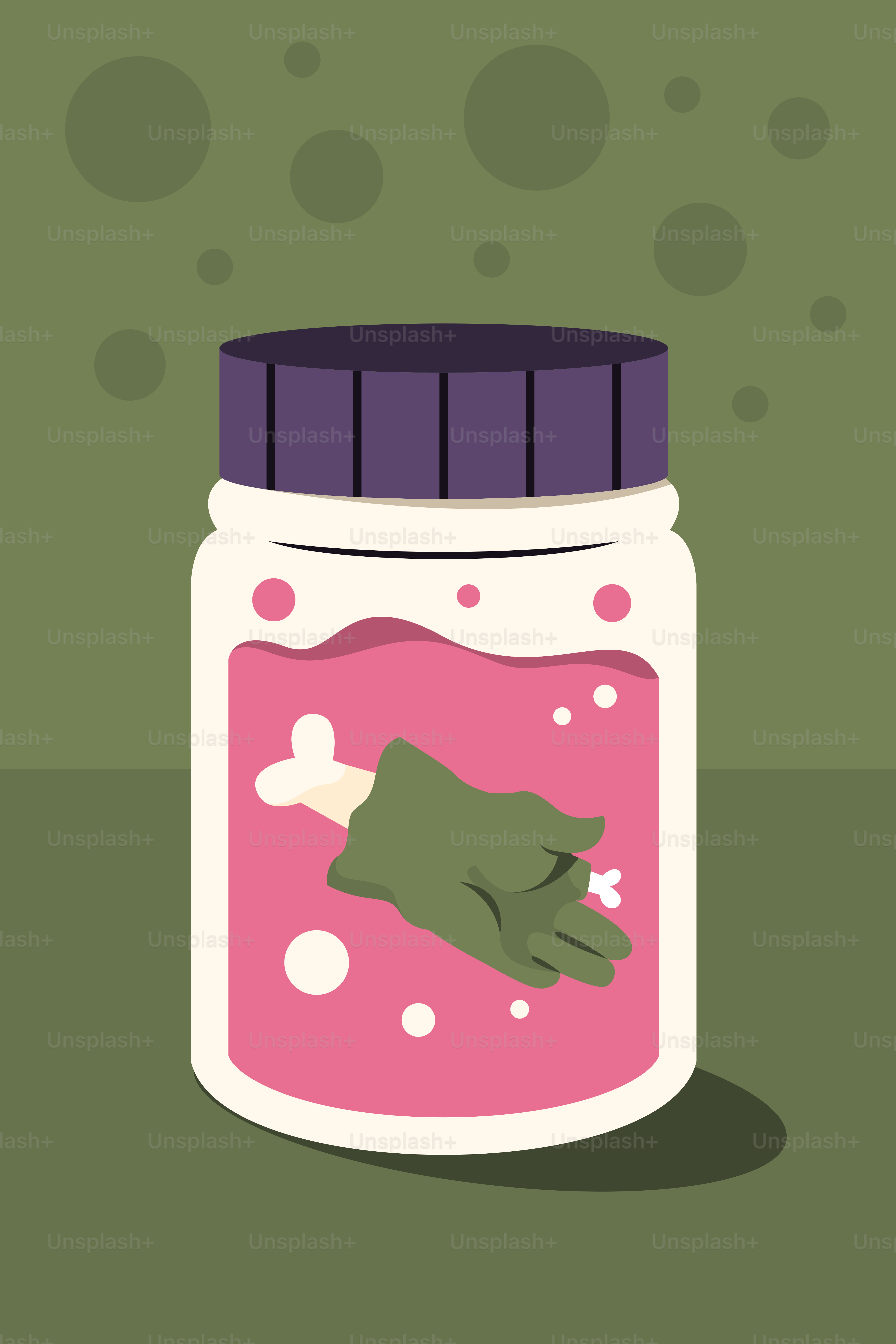 Ein Glas voller rosa Flüssigkeit und ein grüner Frosch