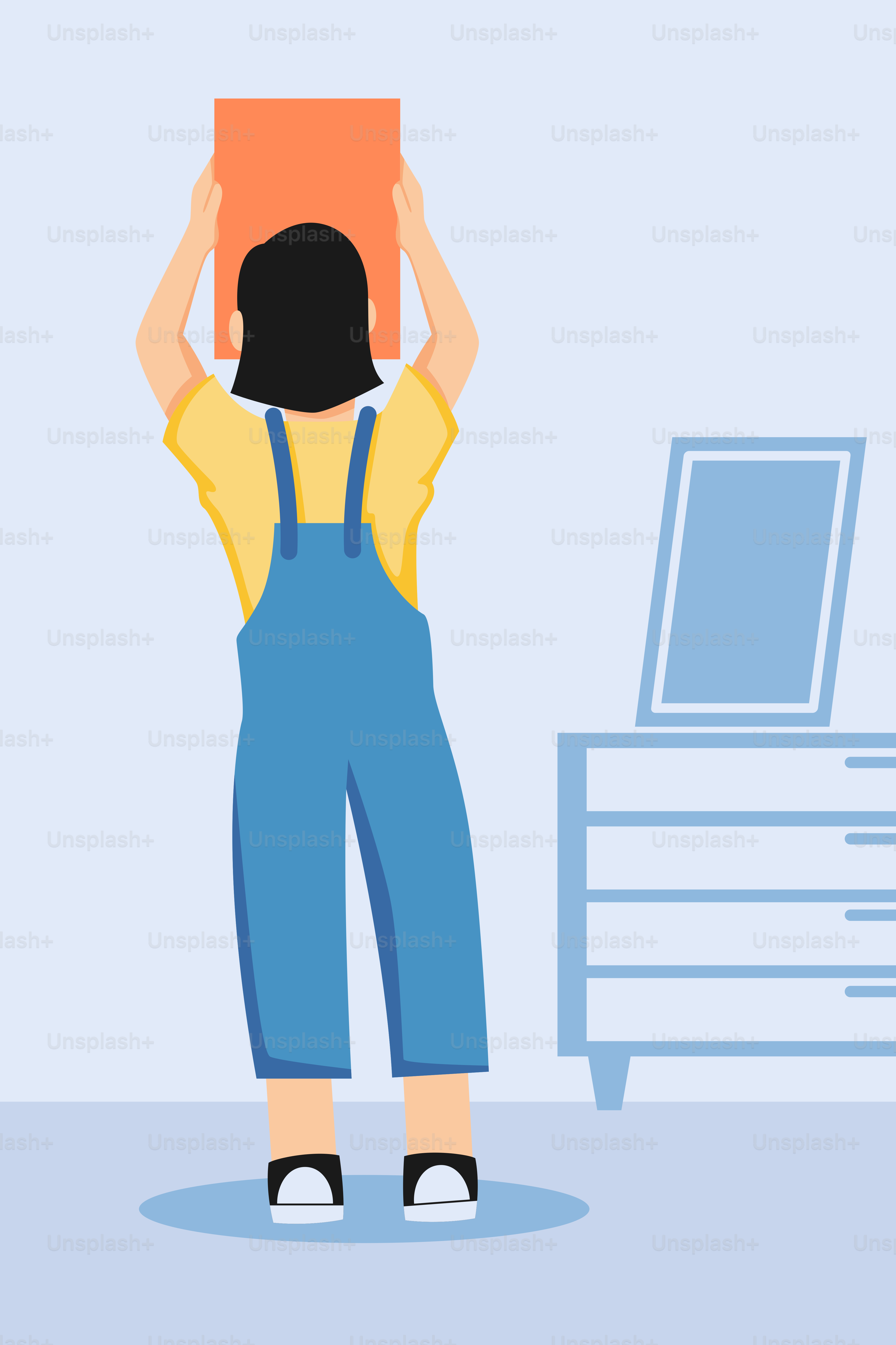 A person standing in front of a dresser holding a box