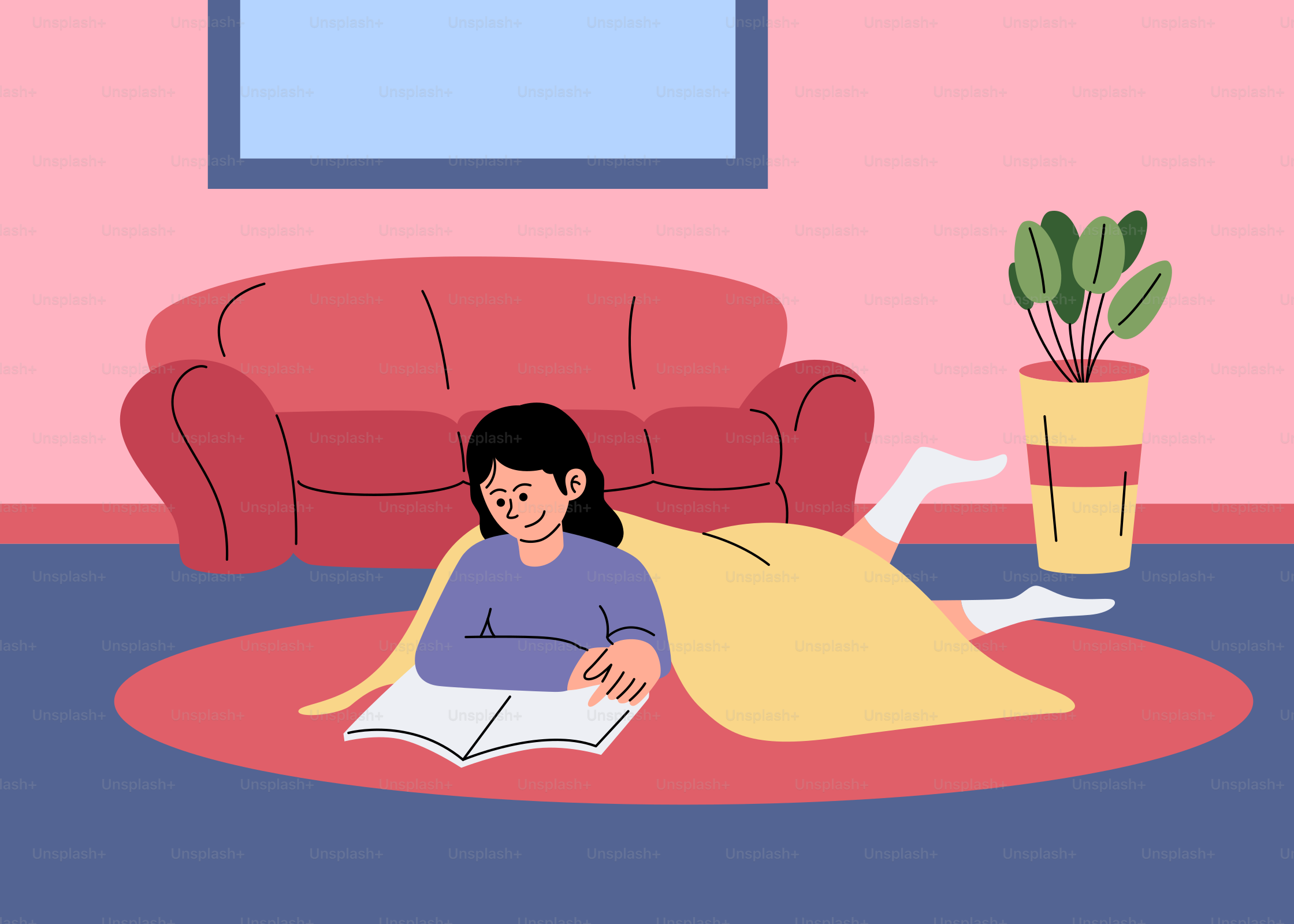 A woman laying on the floor reading a book