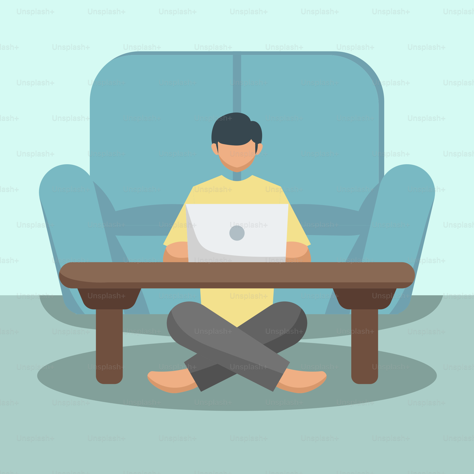 A man sitting in front of a laptop computer