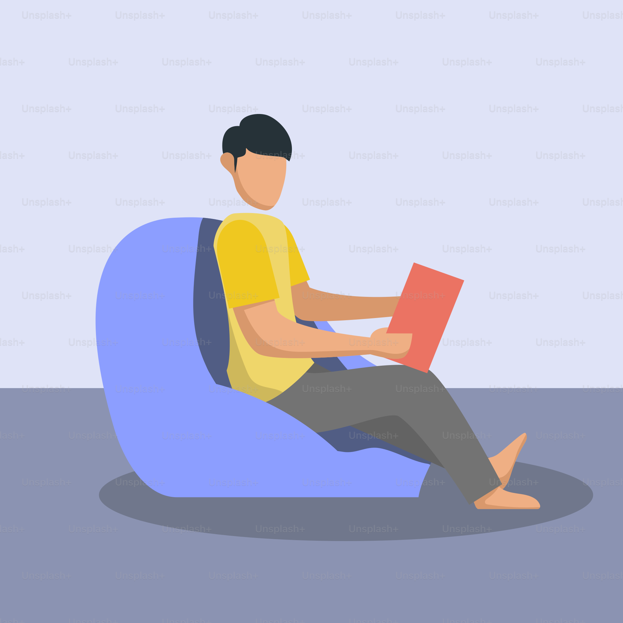 Ein Mann sitzt auf einem Sitzsack und liest ein Buch