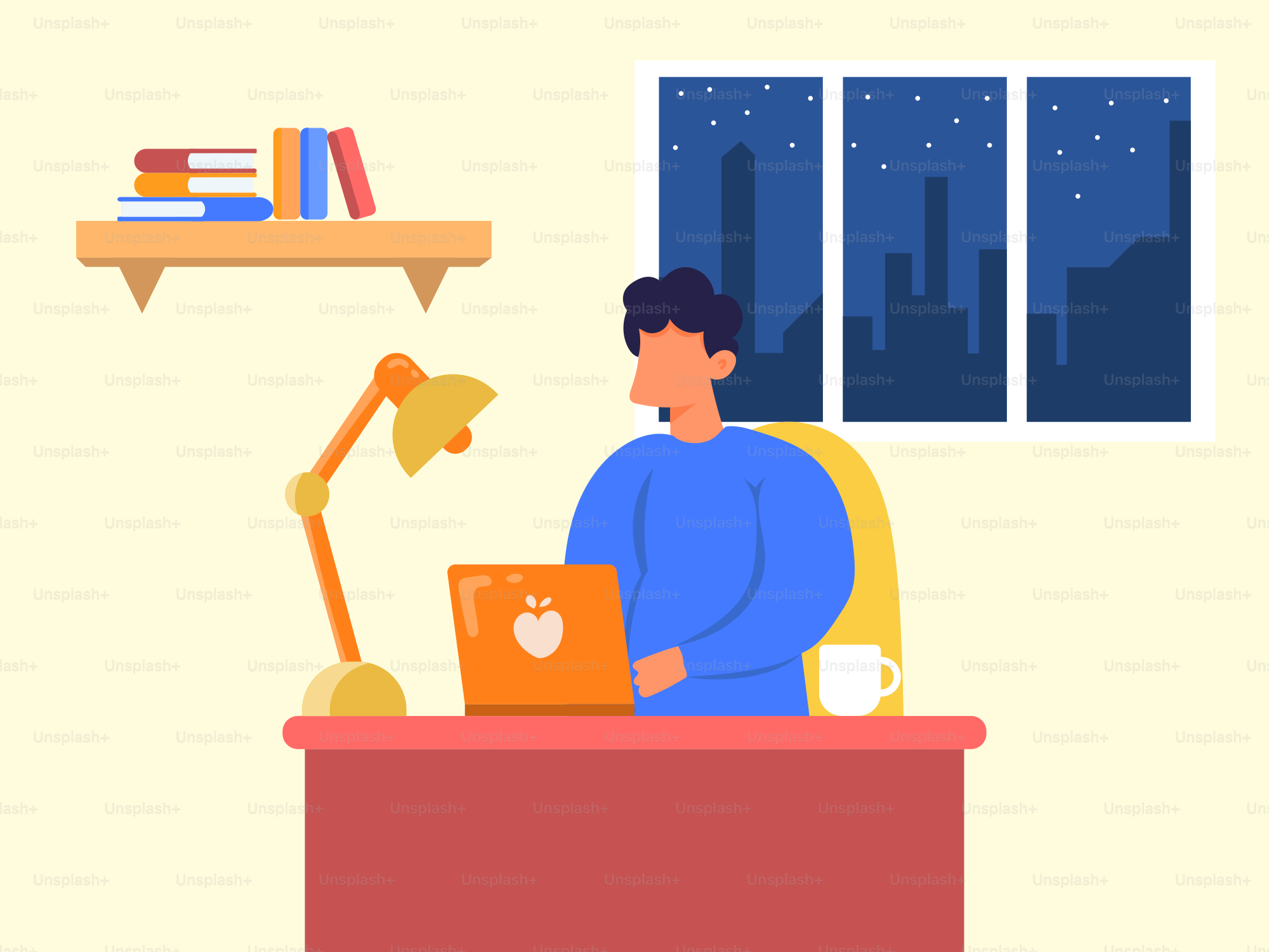 A man sitting at a desk with a laptop