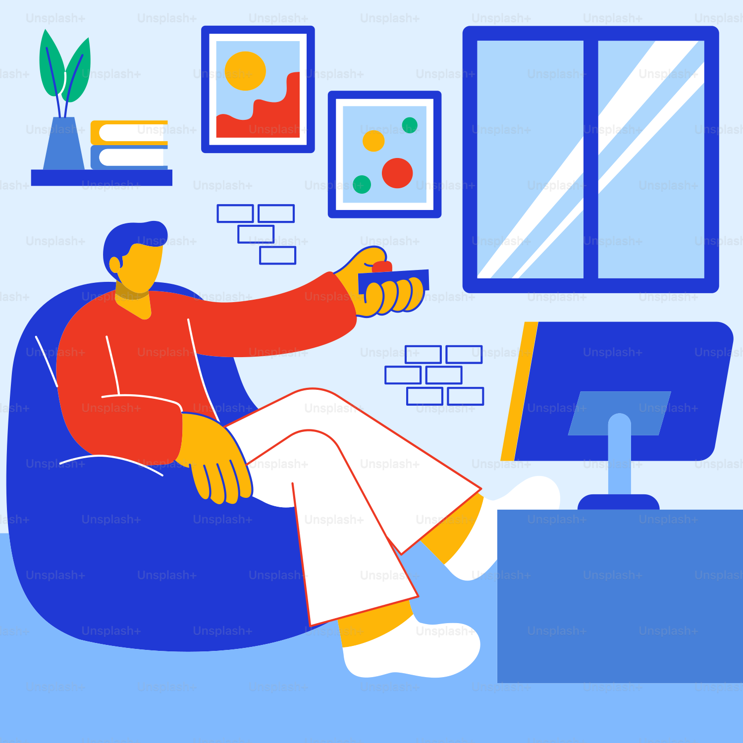 A man sitting in a chair holding a remote control