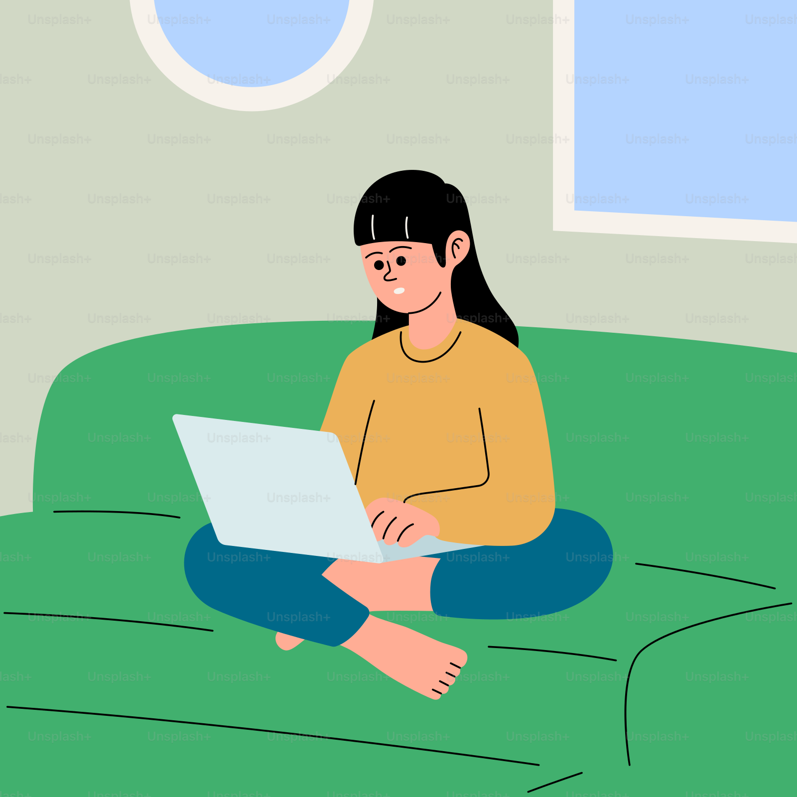 A woman sitting on a couch using a laptop computer