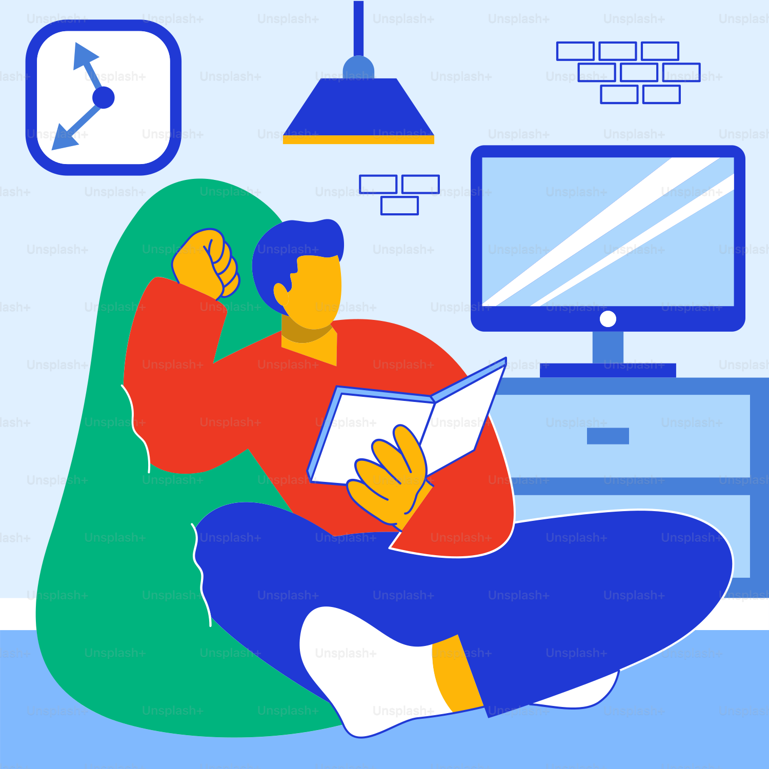 A man sitting in a chair reading a book