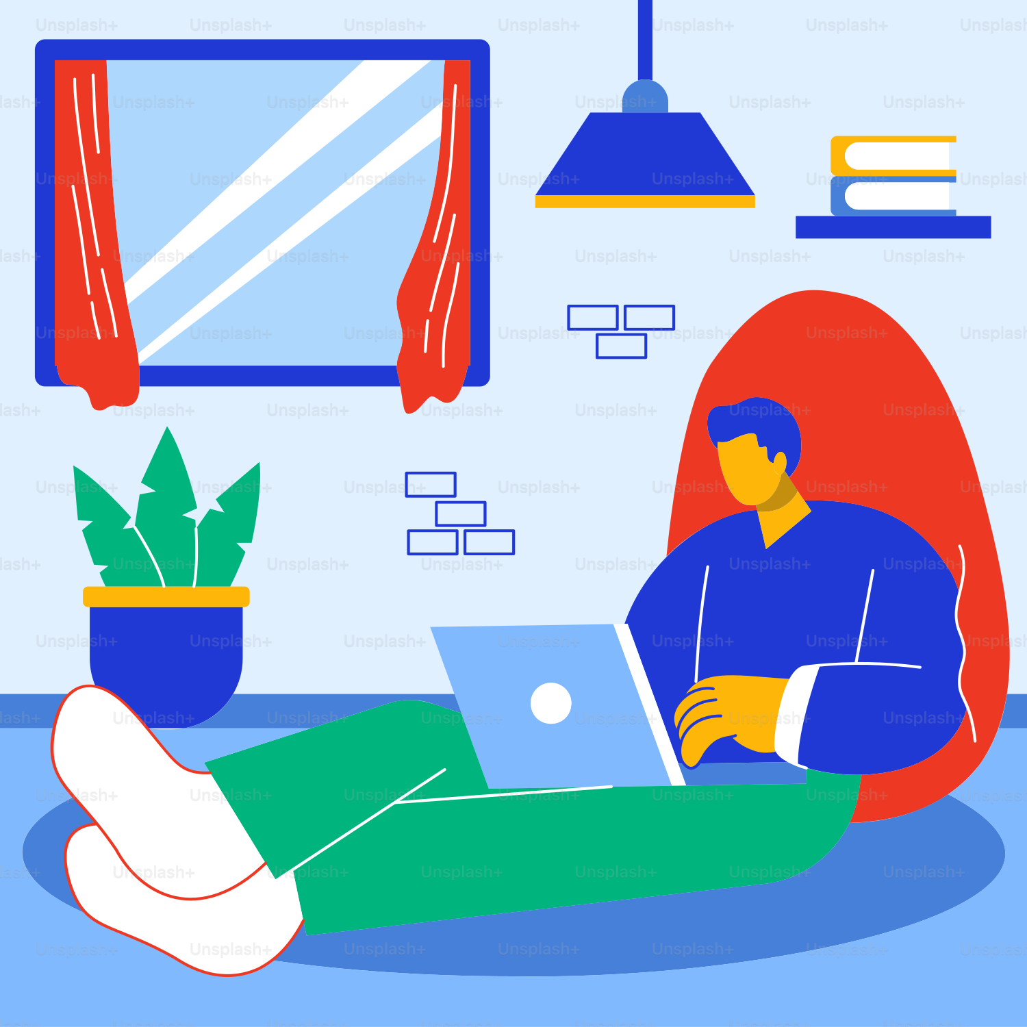 A man sitting in a chair with a laptop on his lap