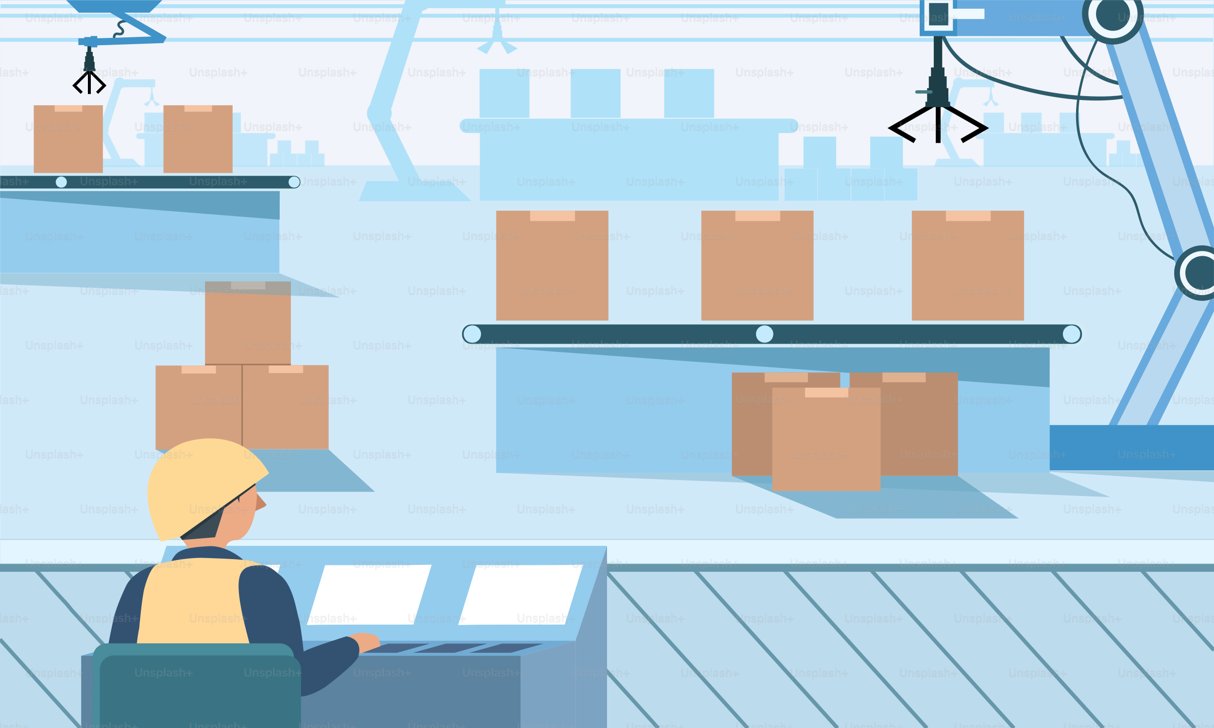 A person sitting at a desk in a warehouse