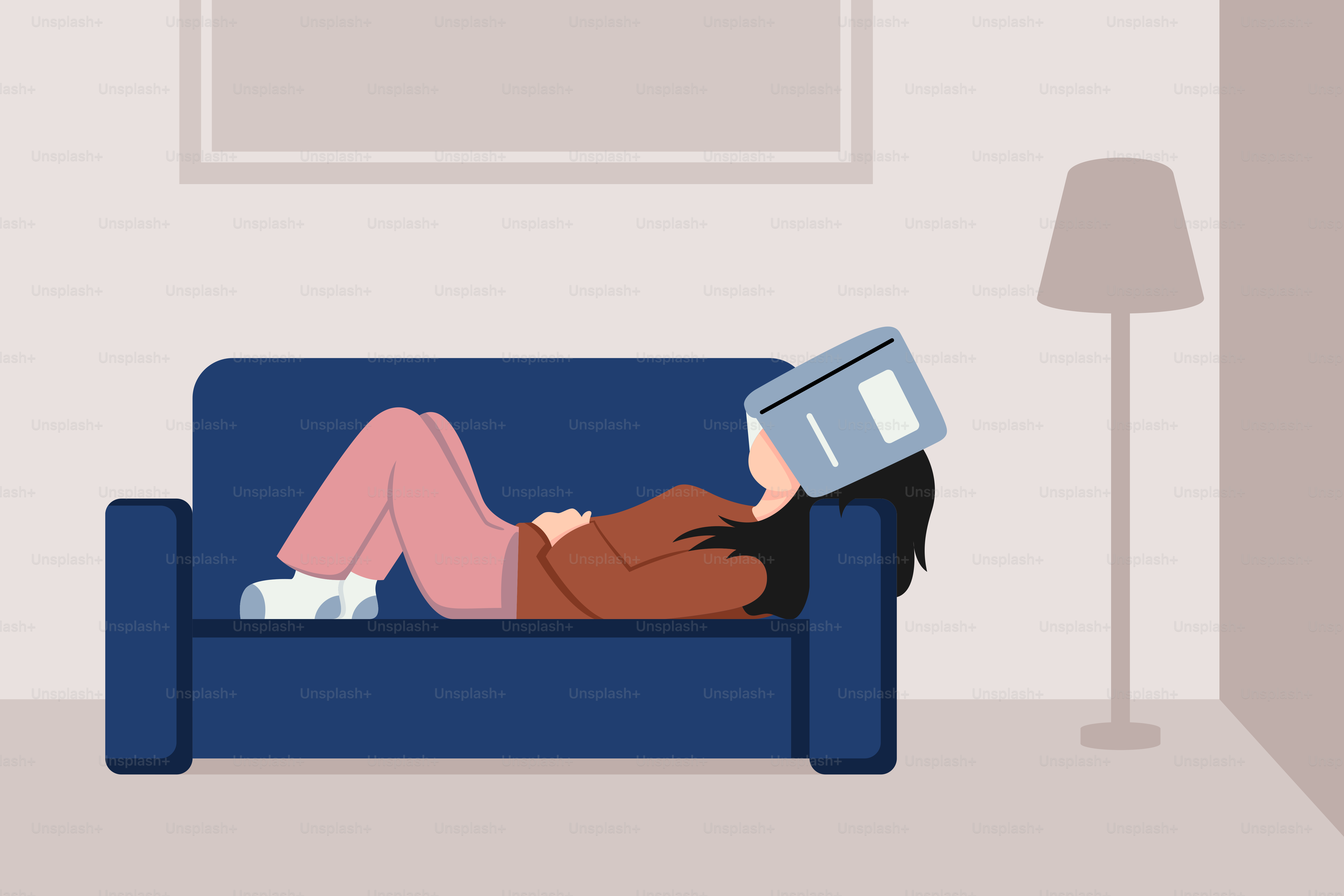 A woman laying on a couch with a laptop