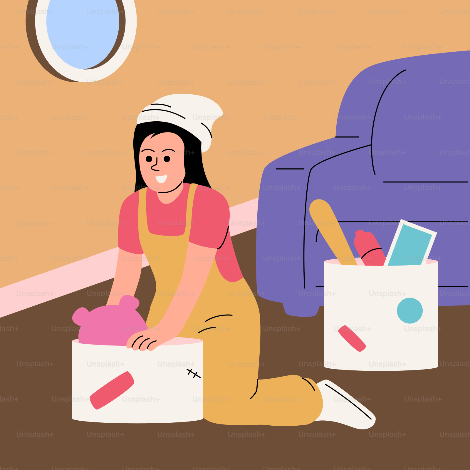 A woman sitting on the floor with a box of items