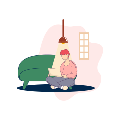 A person sitting on a couch using a laptop