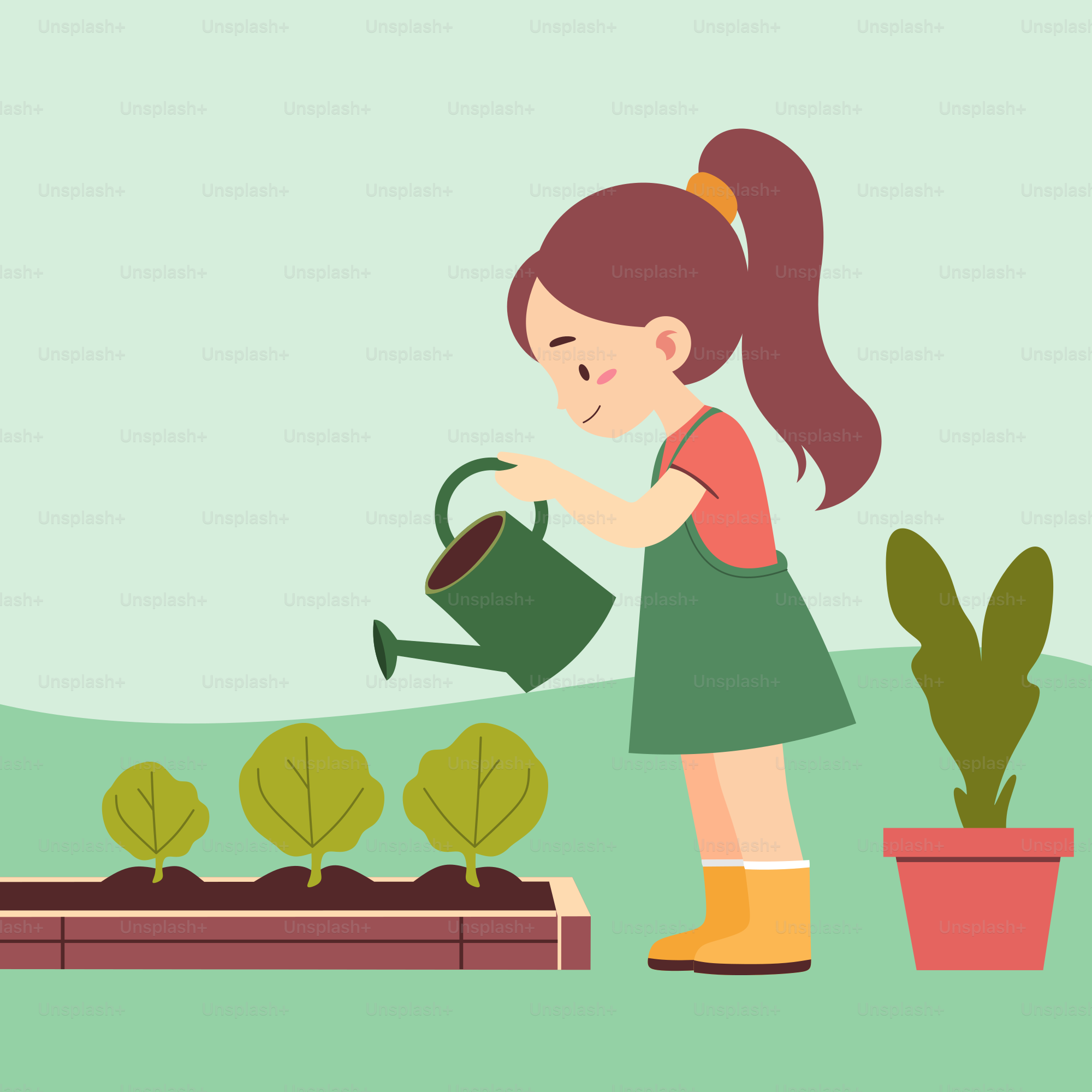 A little girl watering plants in a garden