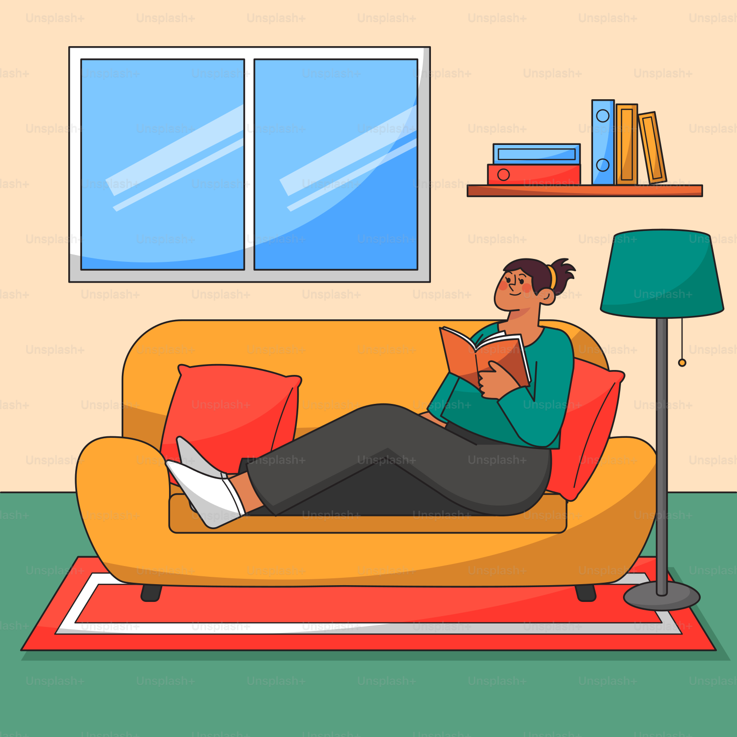 Una persona sentada en un sofá leyendo un libro