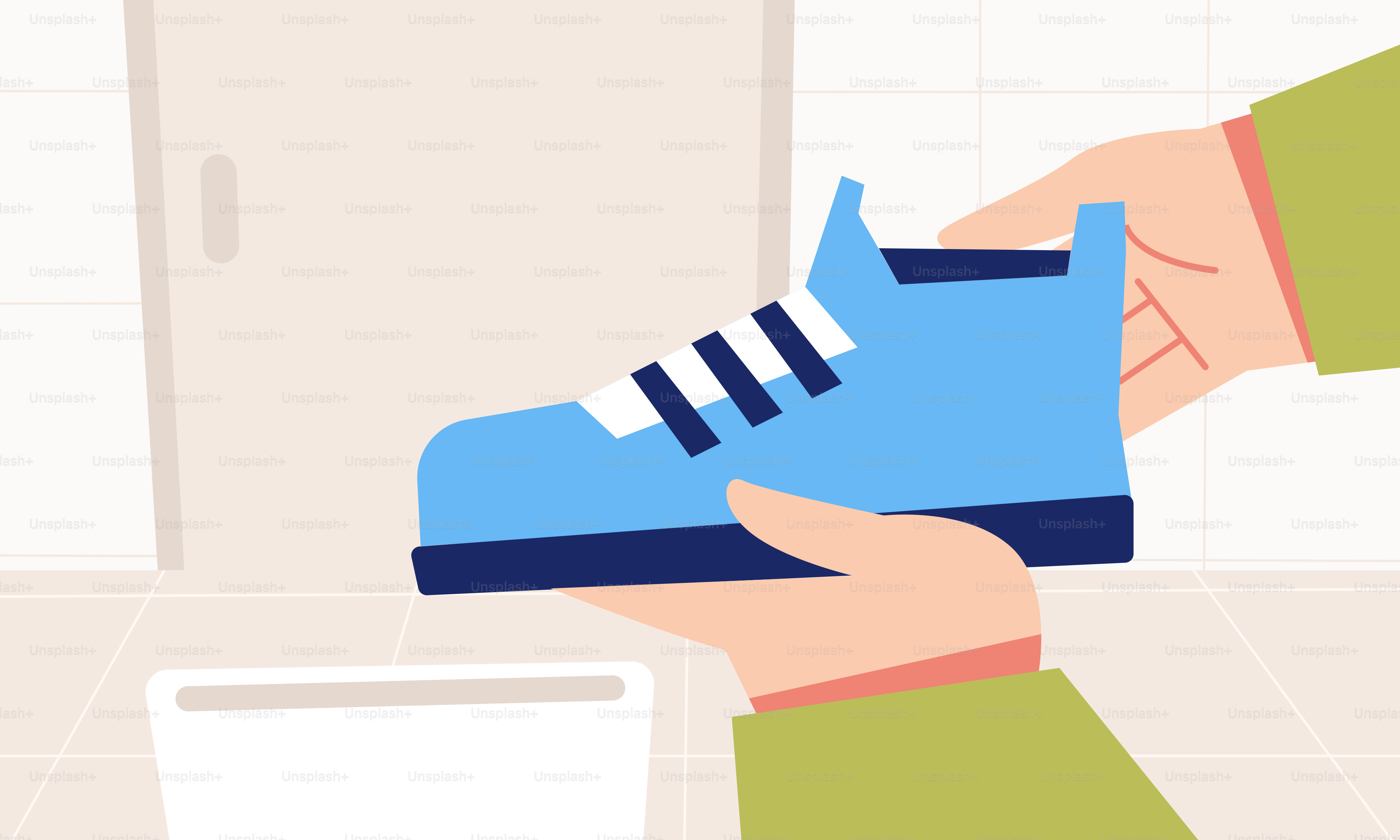 A person is holding a shoe in their hand