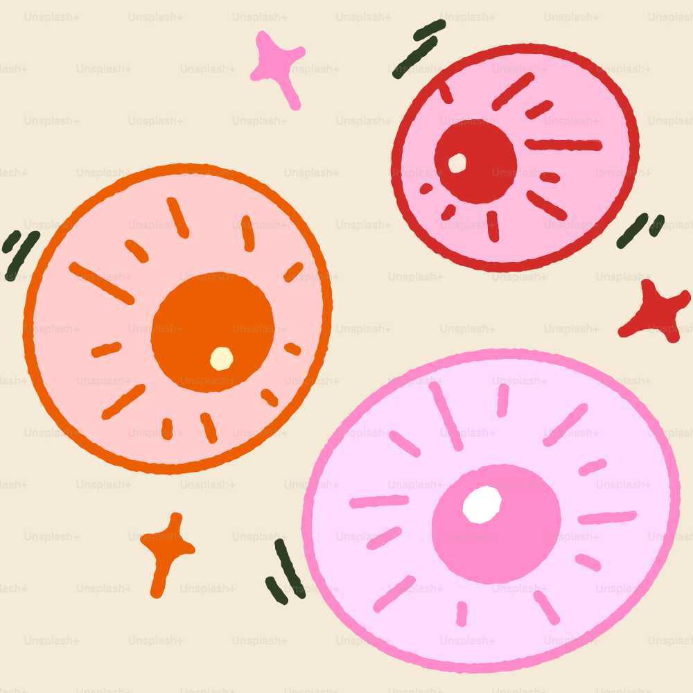 A couple of doughnuts sitting on top of a table