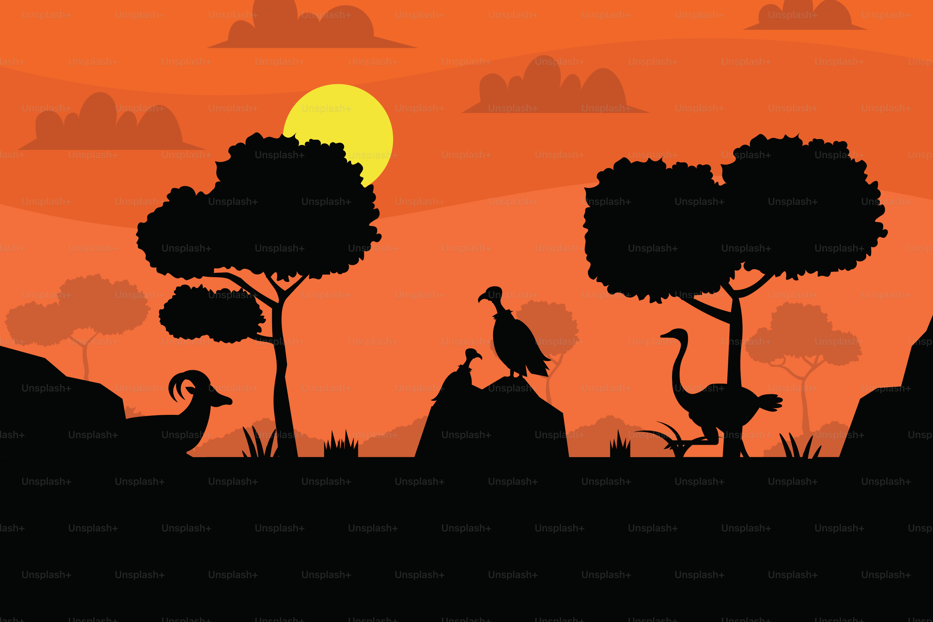 動物や木々のシルエットが映し出された夕焼けの風景