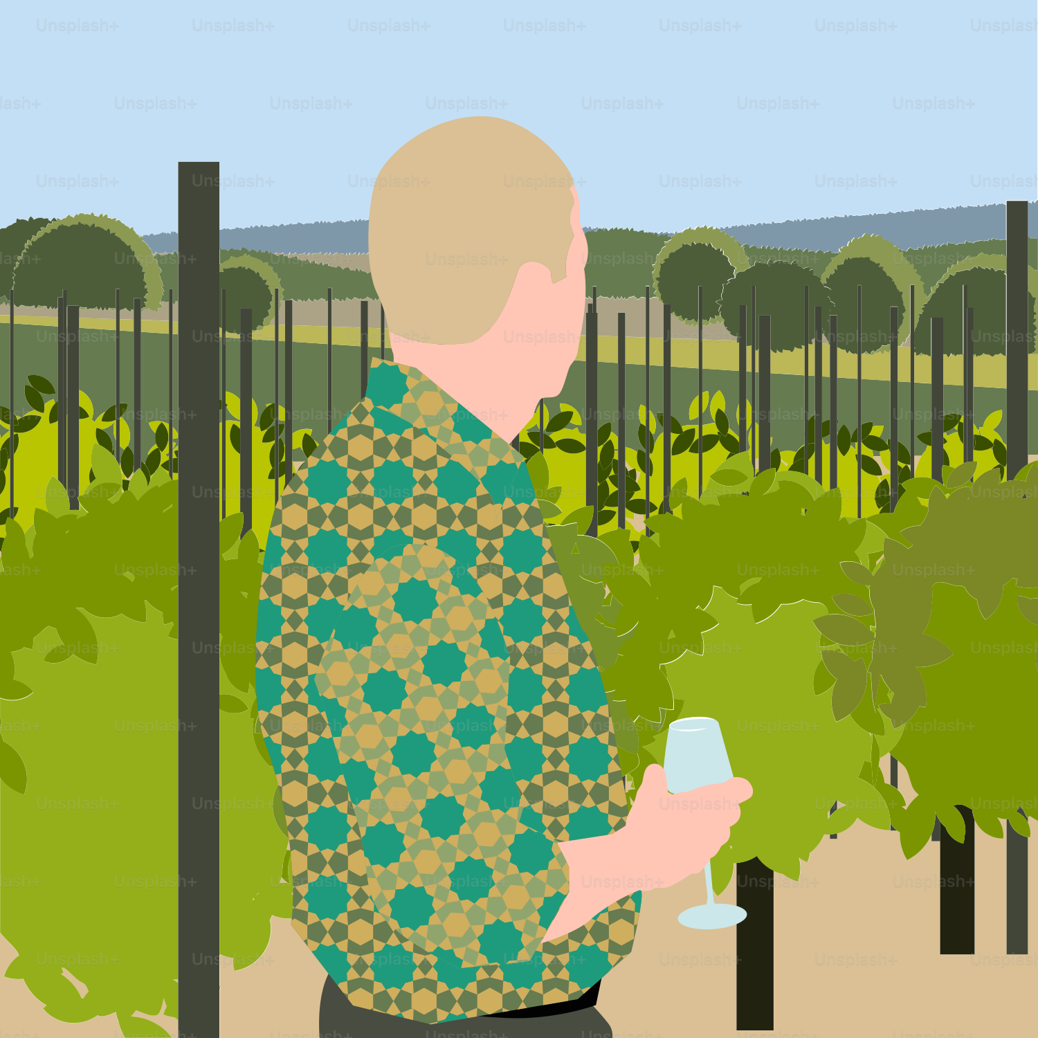 A man holding a wine glass standing in front of a vineyard