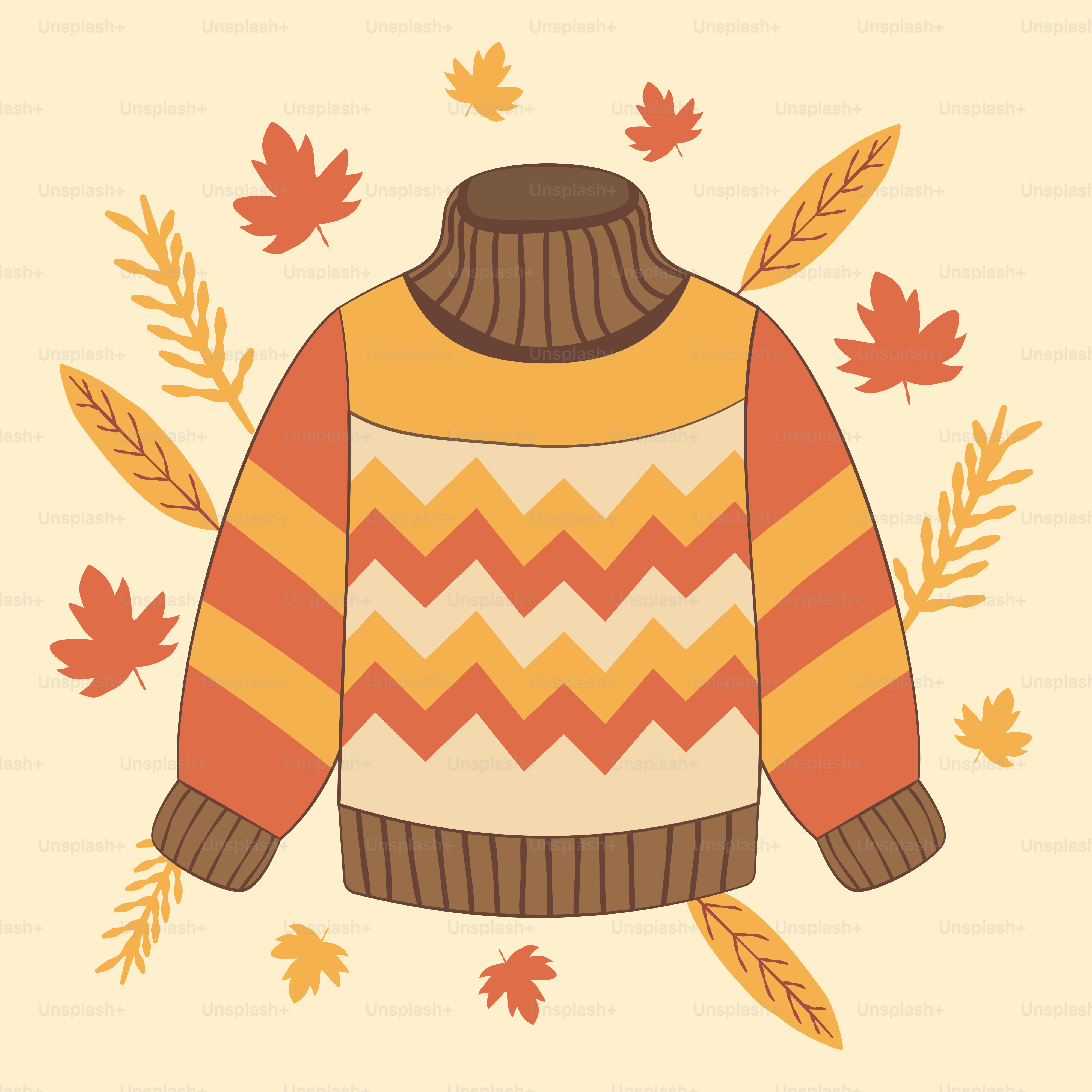 A sweater with leaves around it on a beige background