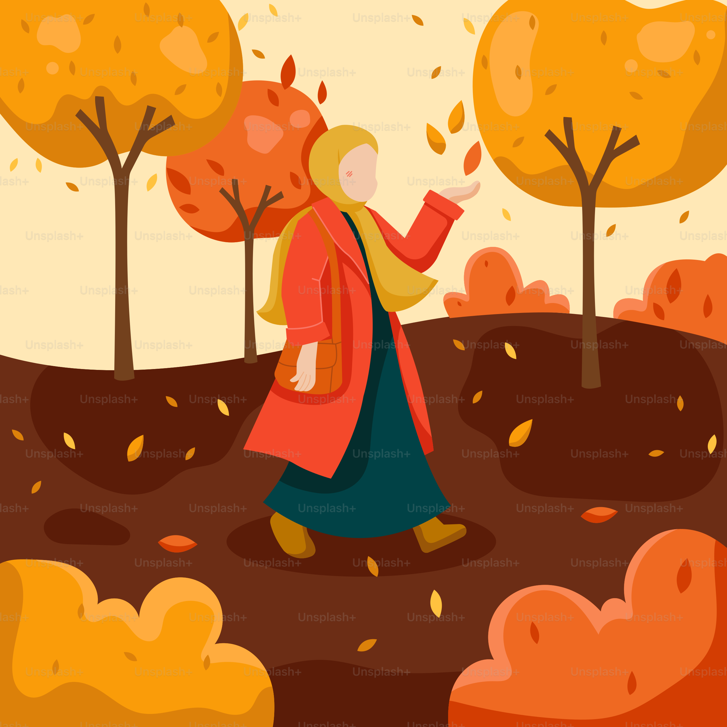 A woman walking through a park in the fall
