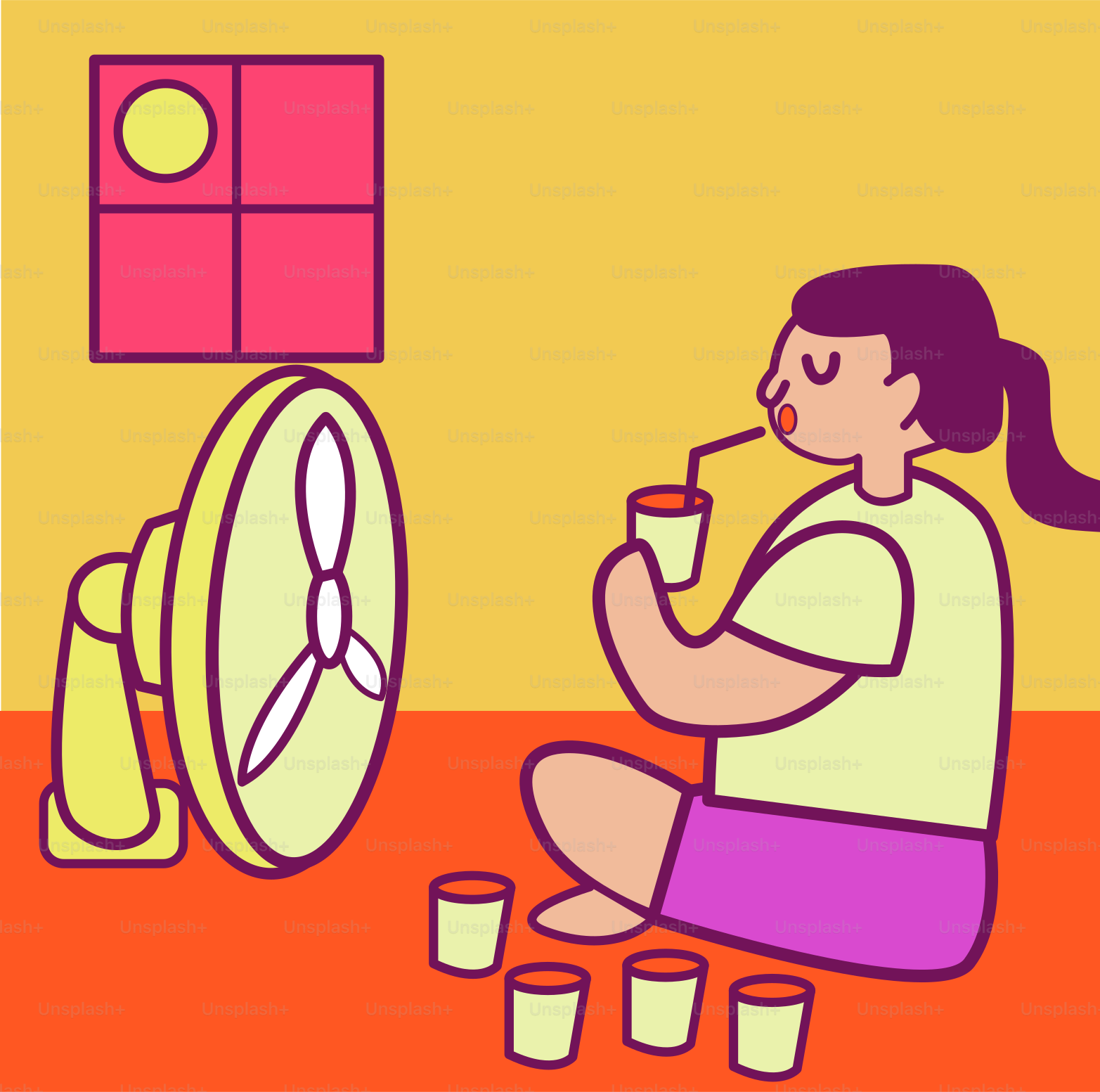 扇風機の隣の床に座る女性