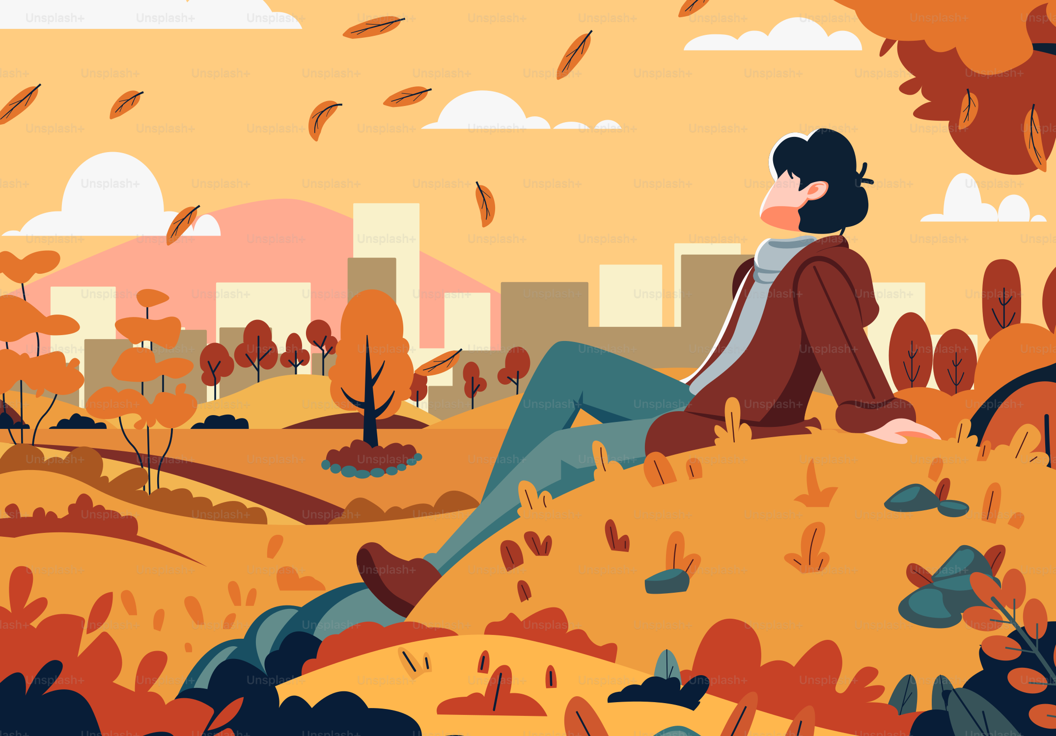 A person sitting on a hill in the fall
