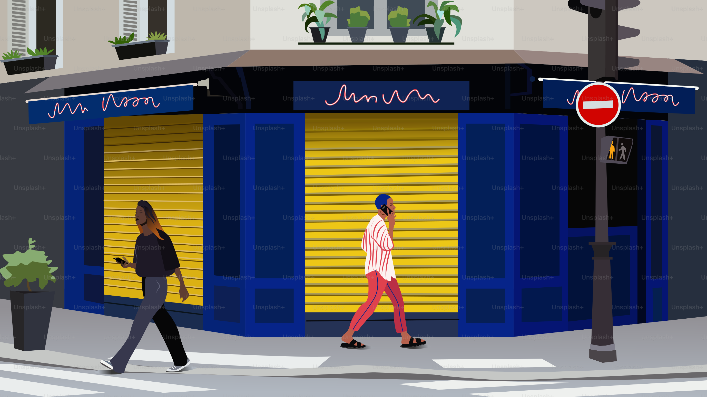 A couple of people that are walking down a street