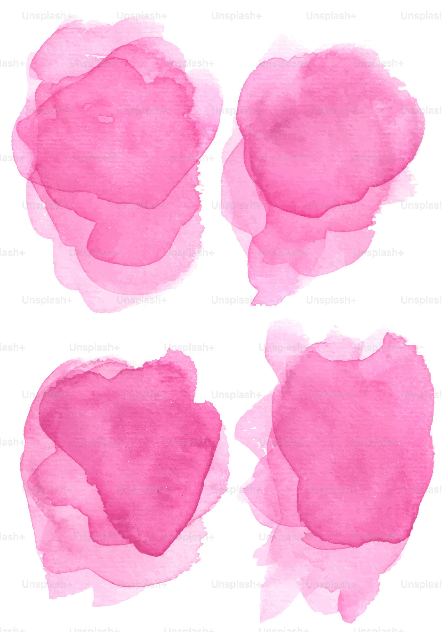 A set of pink watercolor stains on a white background