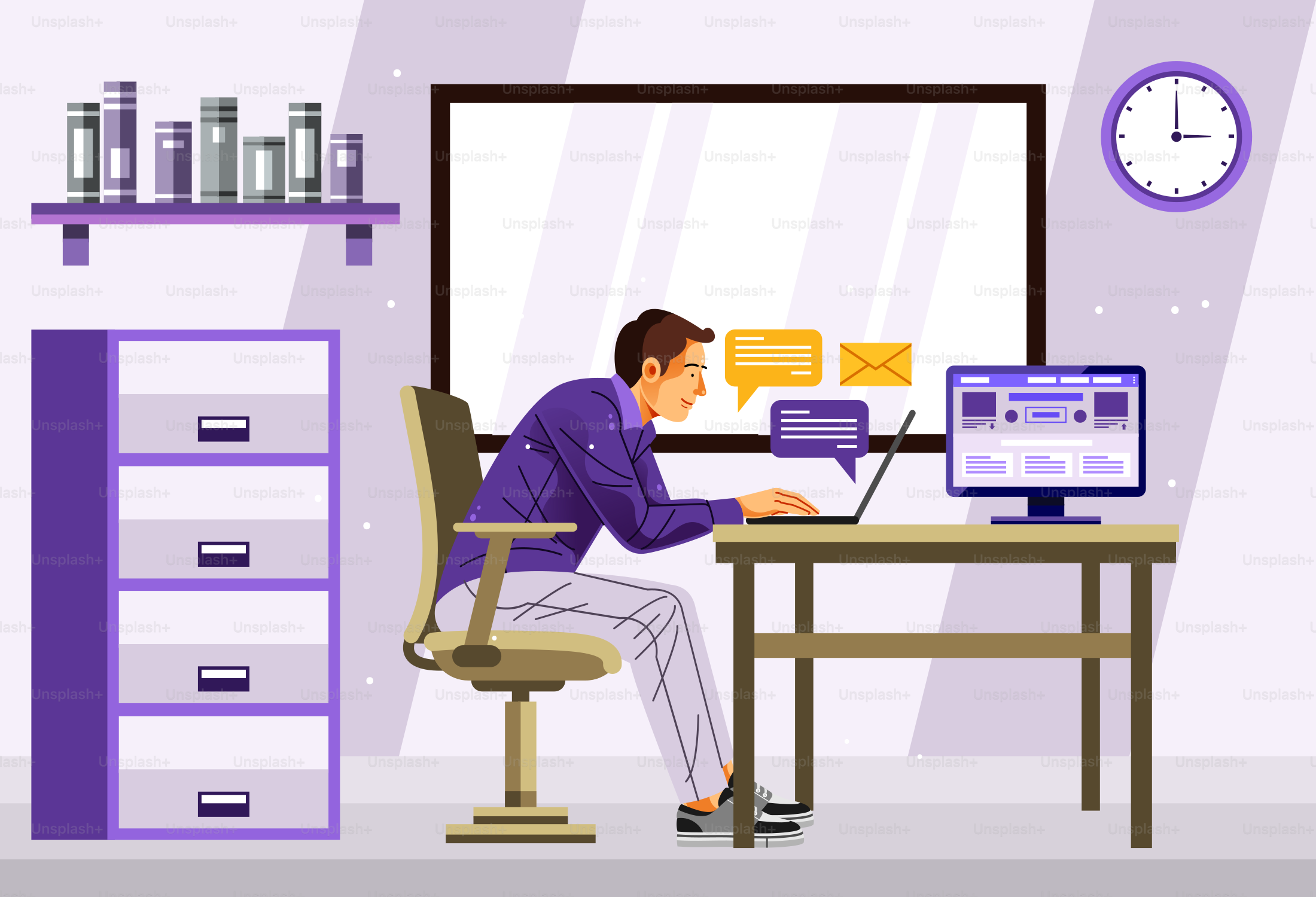 A man sitting at a desk in front of a computer