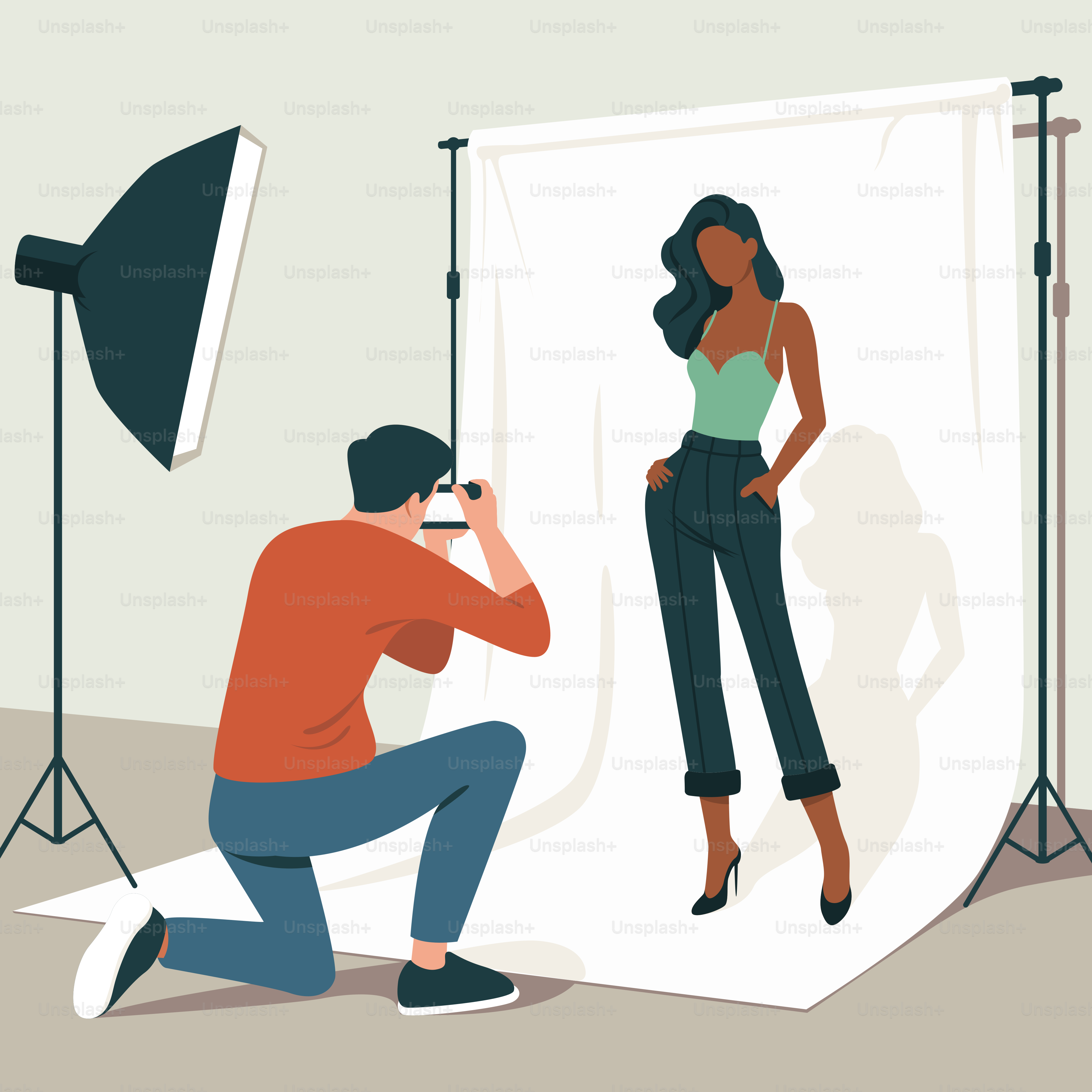 A man taking a picture of a woman in a photo studio