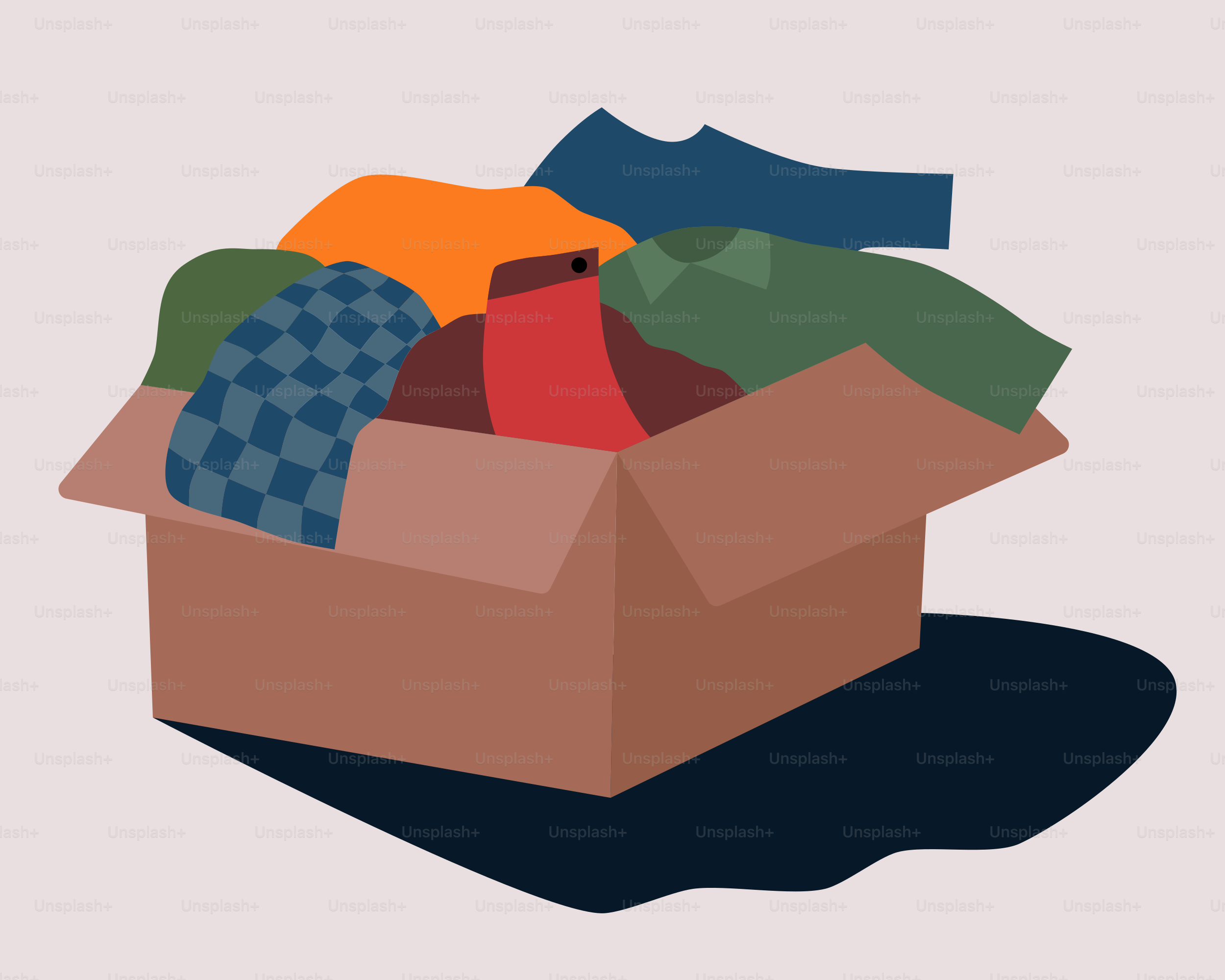 A cardboard box filled with clothes and socks