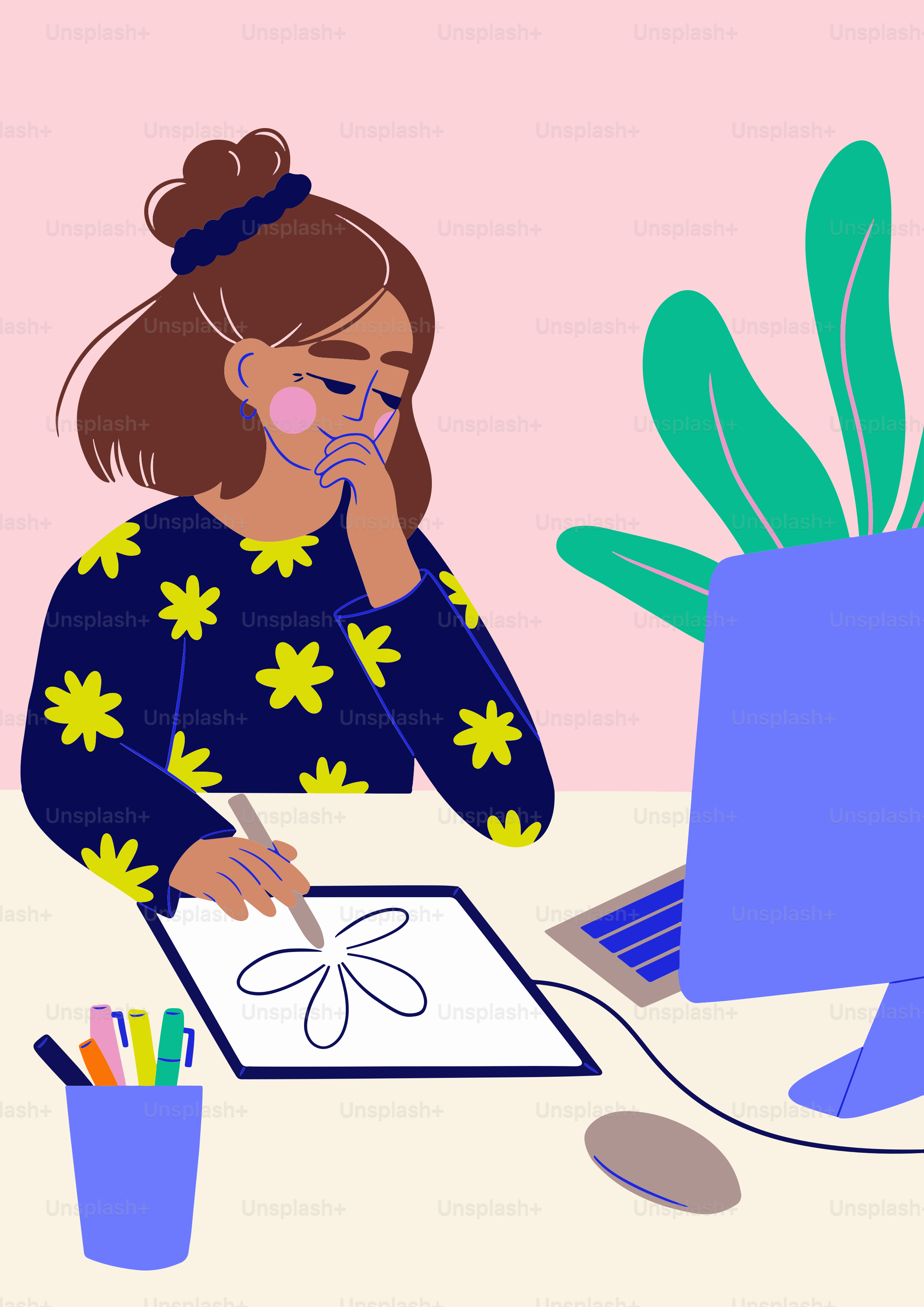 A woman sitting at a desk in front of a computer