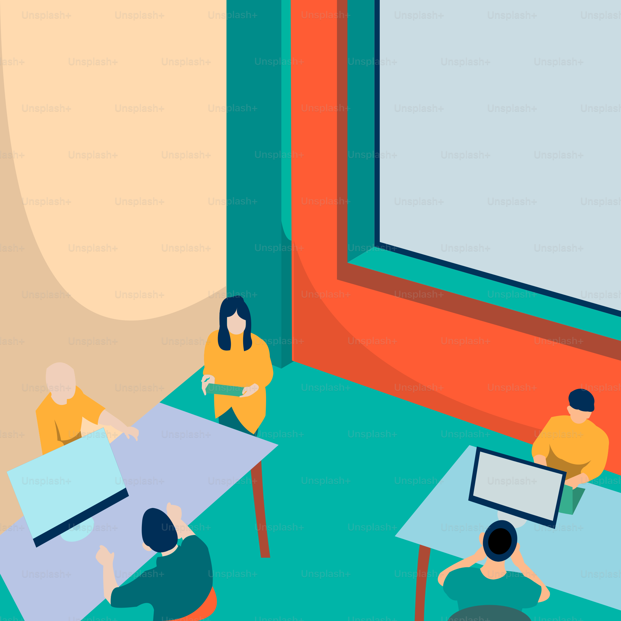 A group of people sitting around a table with laptops