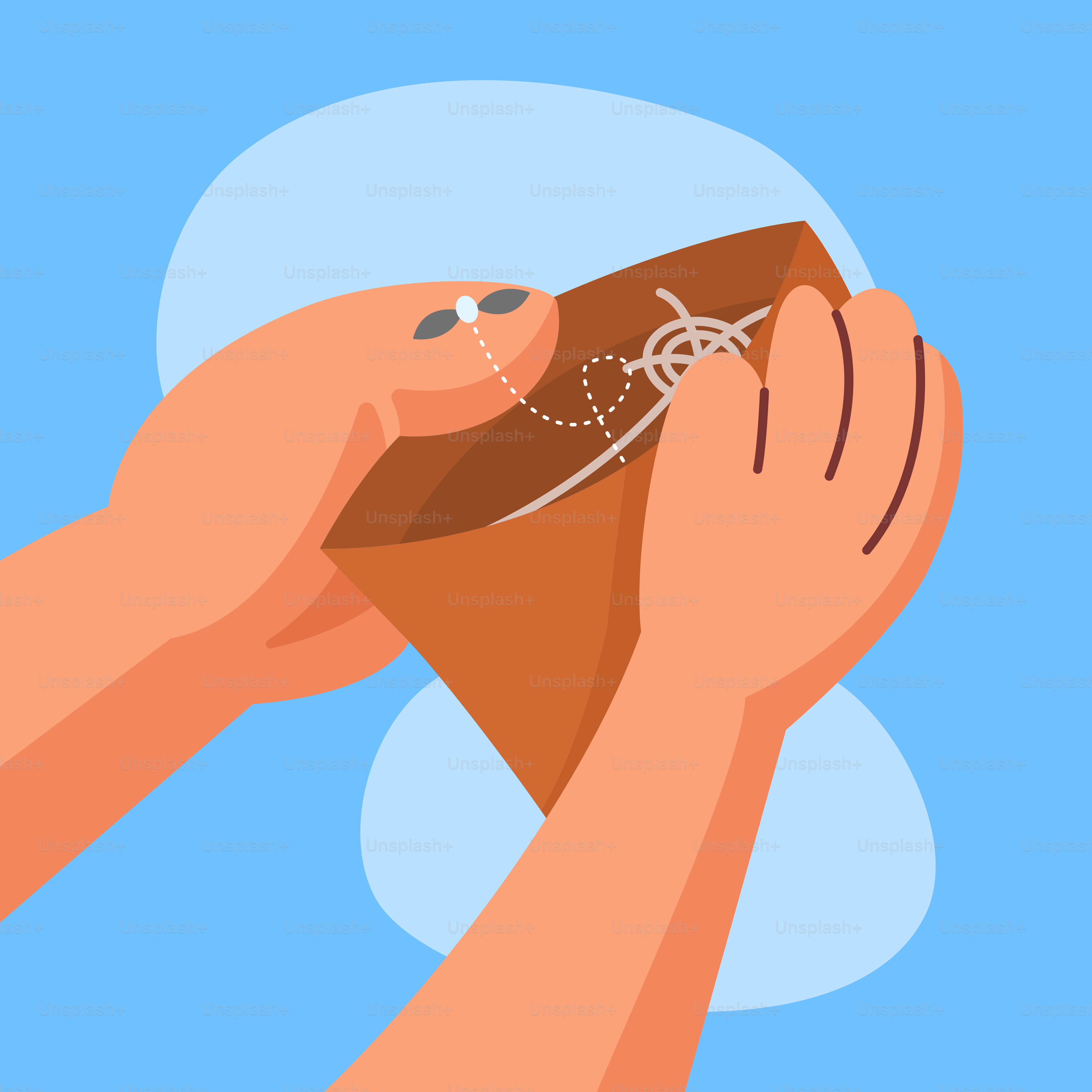 A person holding a brown object in their hand