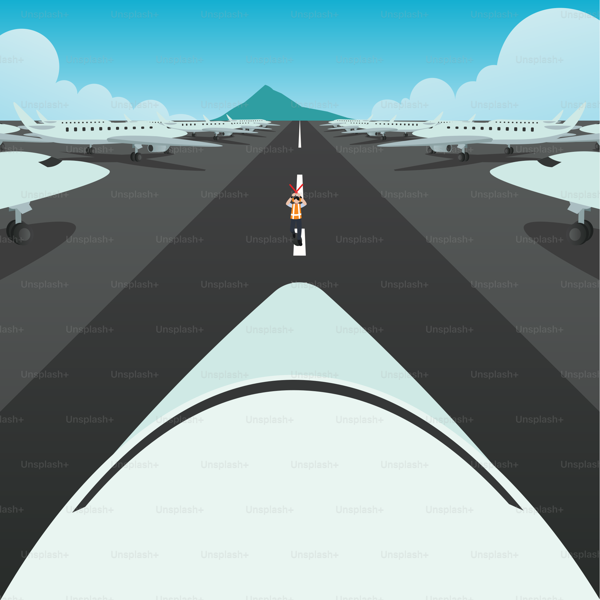 A person walking across an airport runway