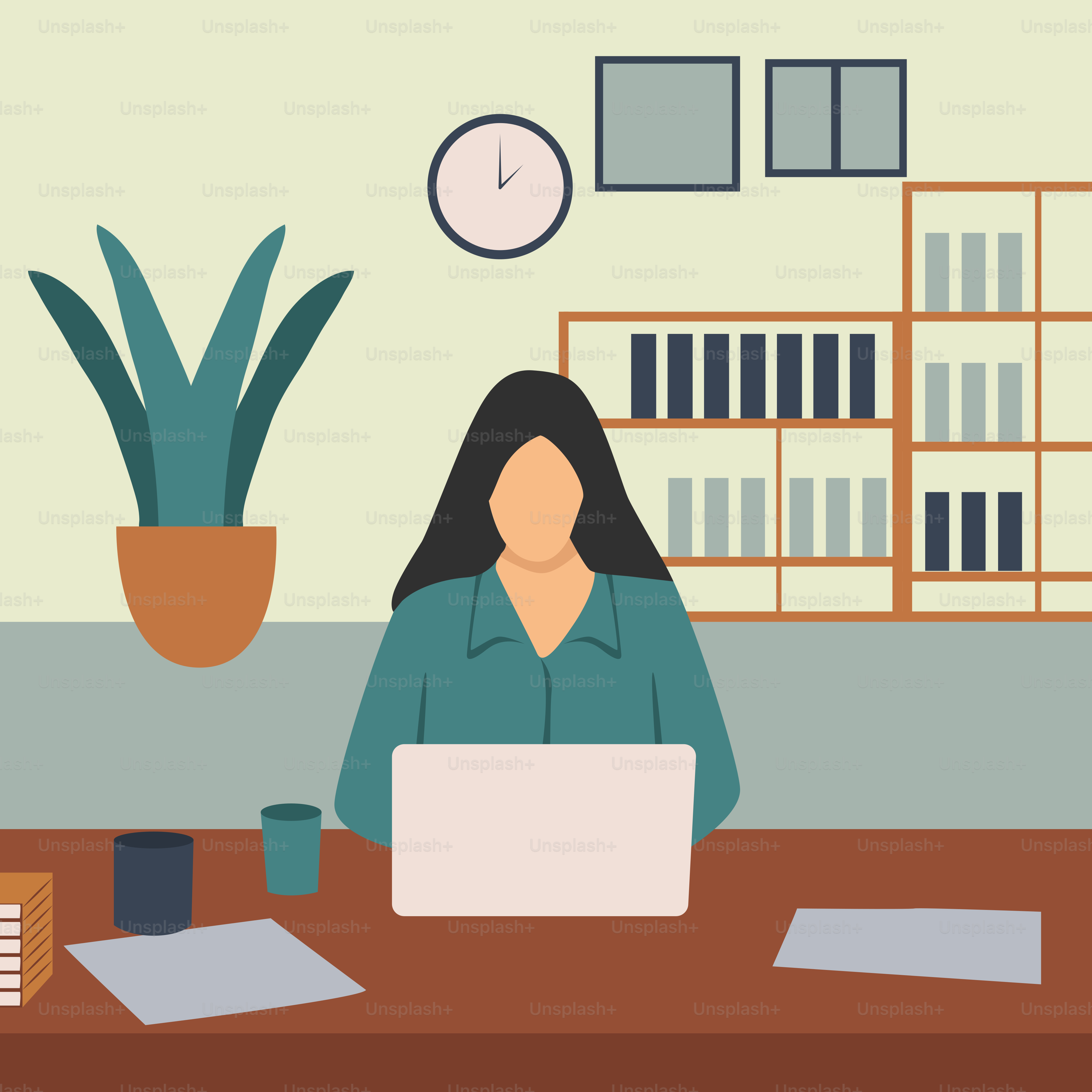 Une femme assise à un bureau avec un ordinateur portable