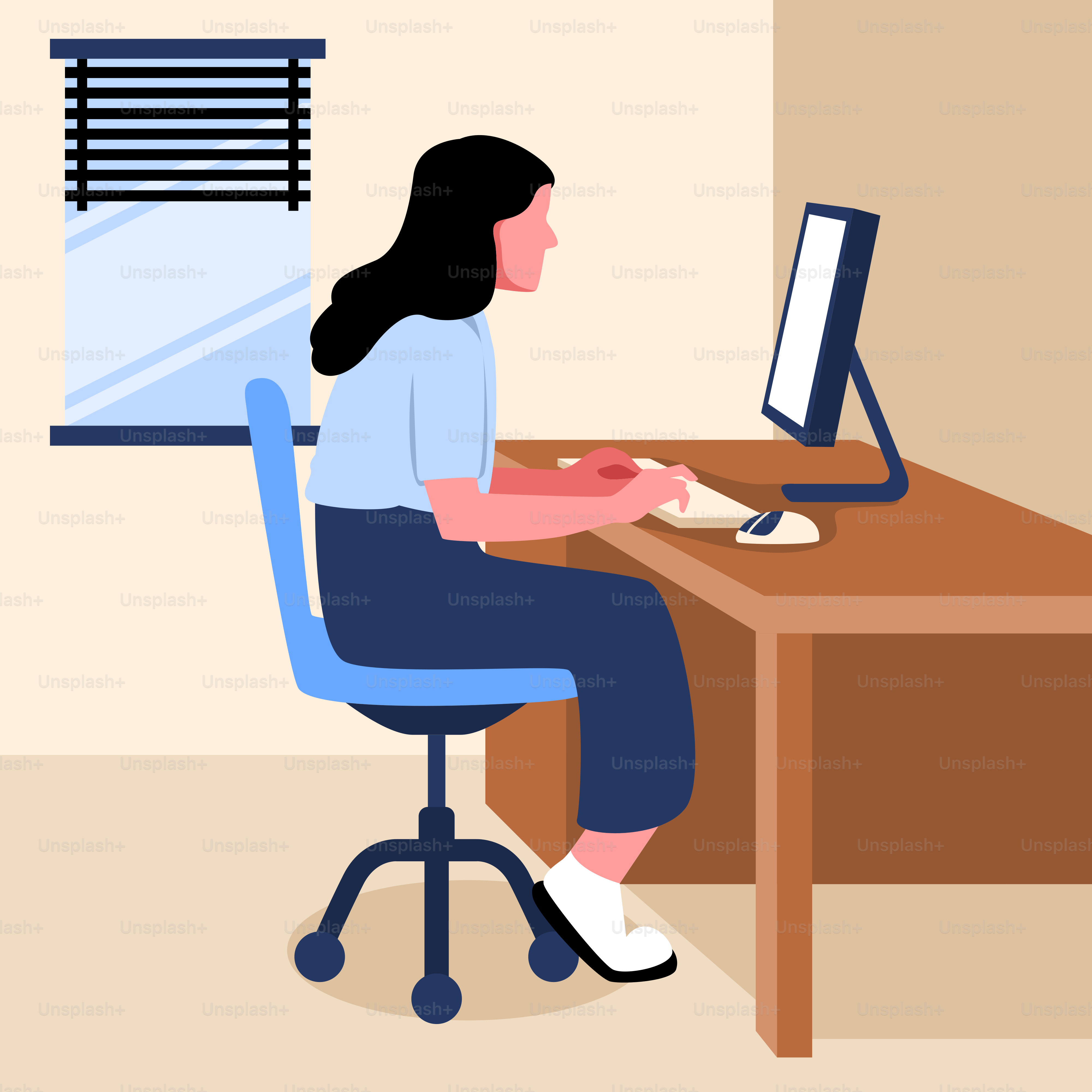 A woman sitting at a desk in front of a computer