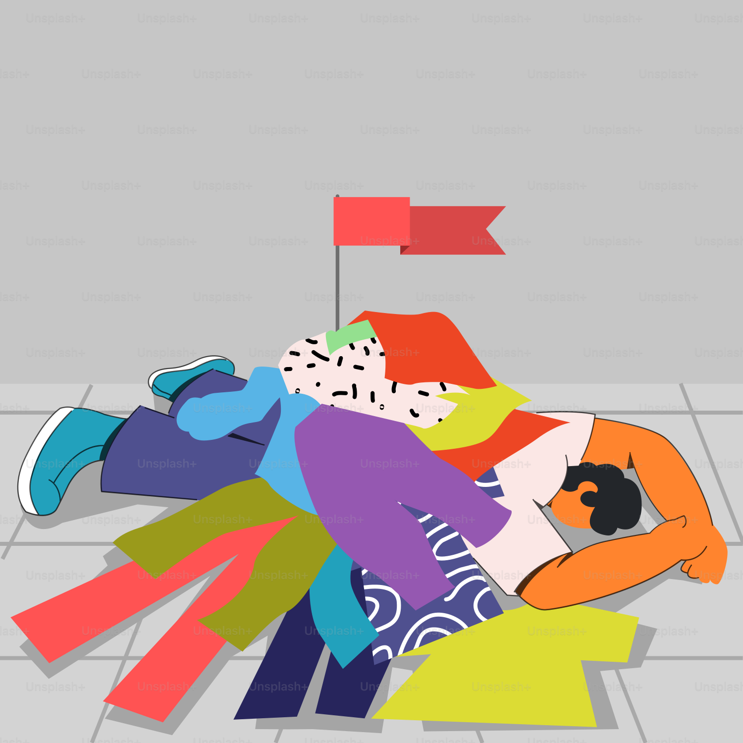 A person laying on the ground with a flag in the background