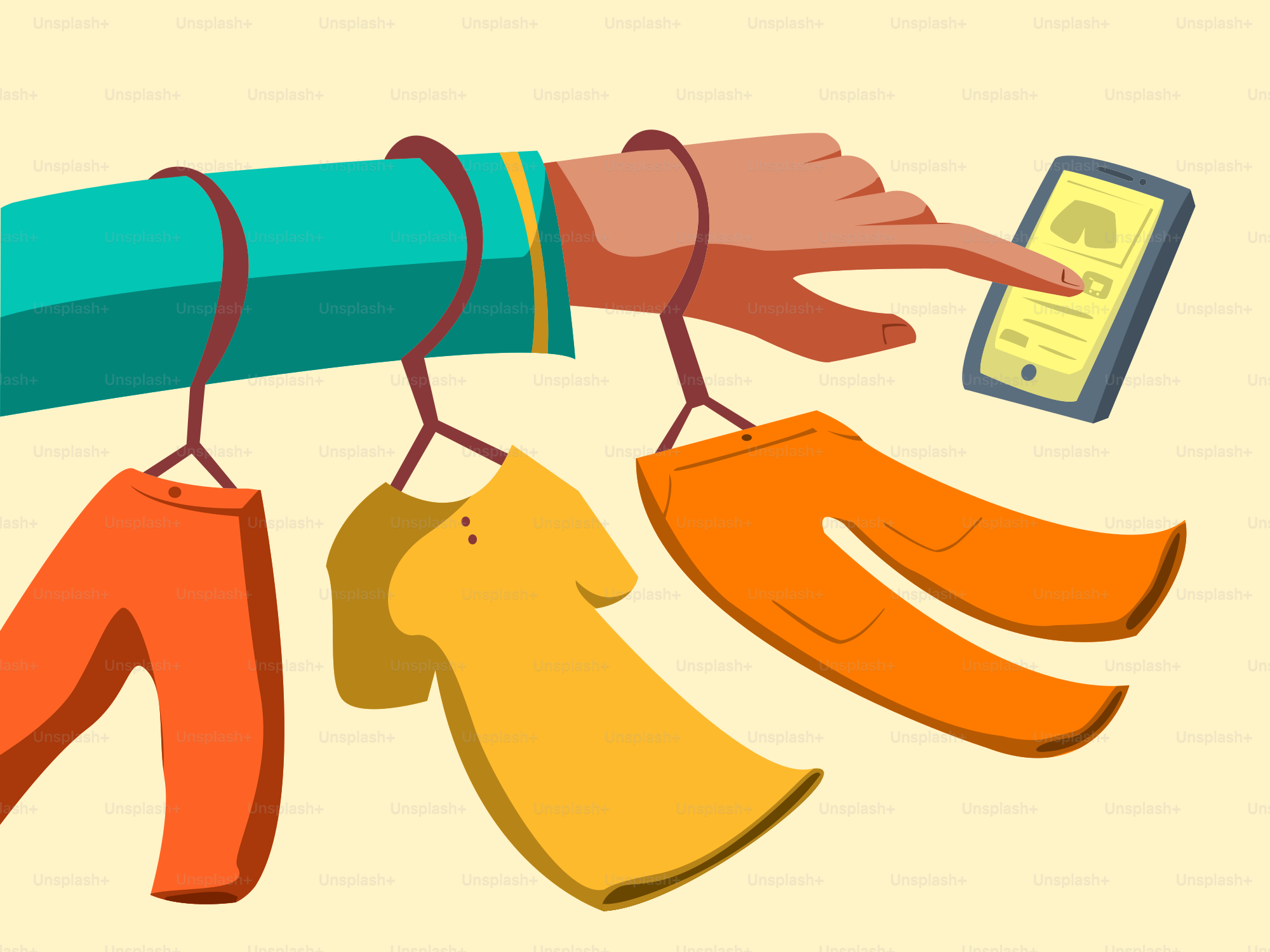 A hand holding a cell phone next to a bunch of clothes