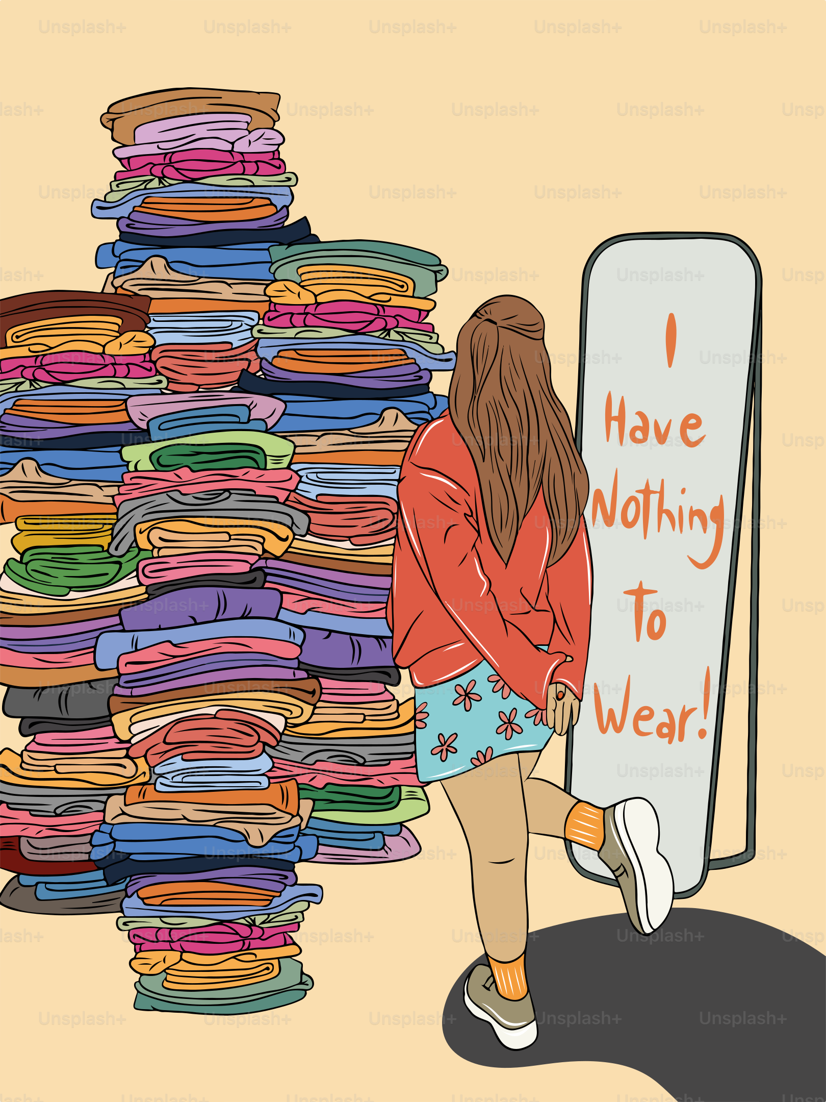 A woman standing next to a pile of clothes