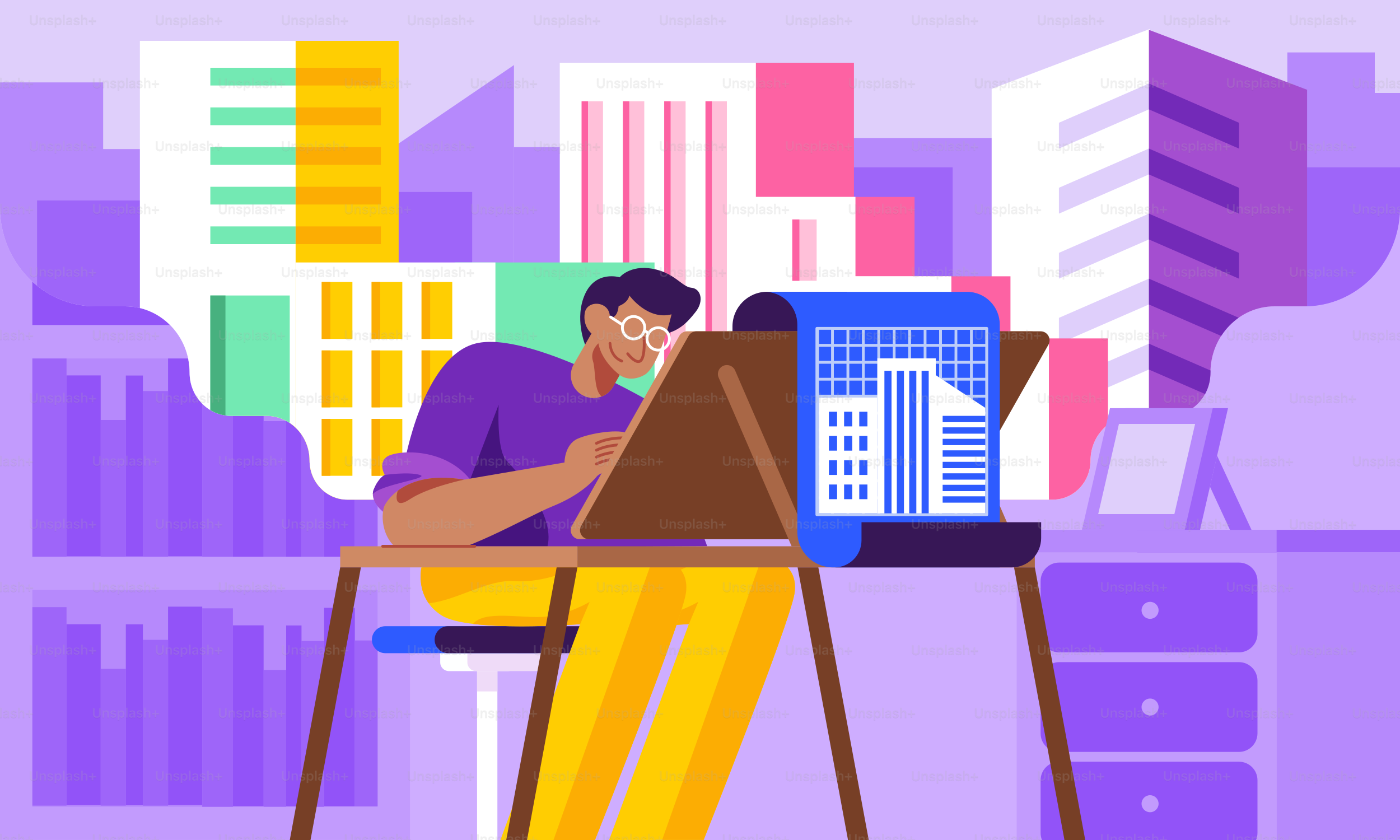 A man sitting at a desk with a laptop