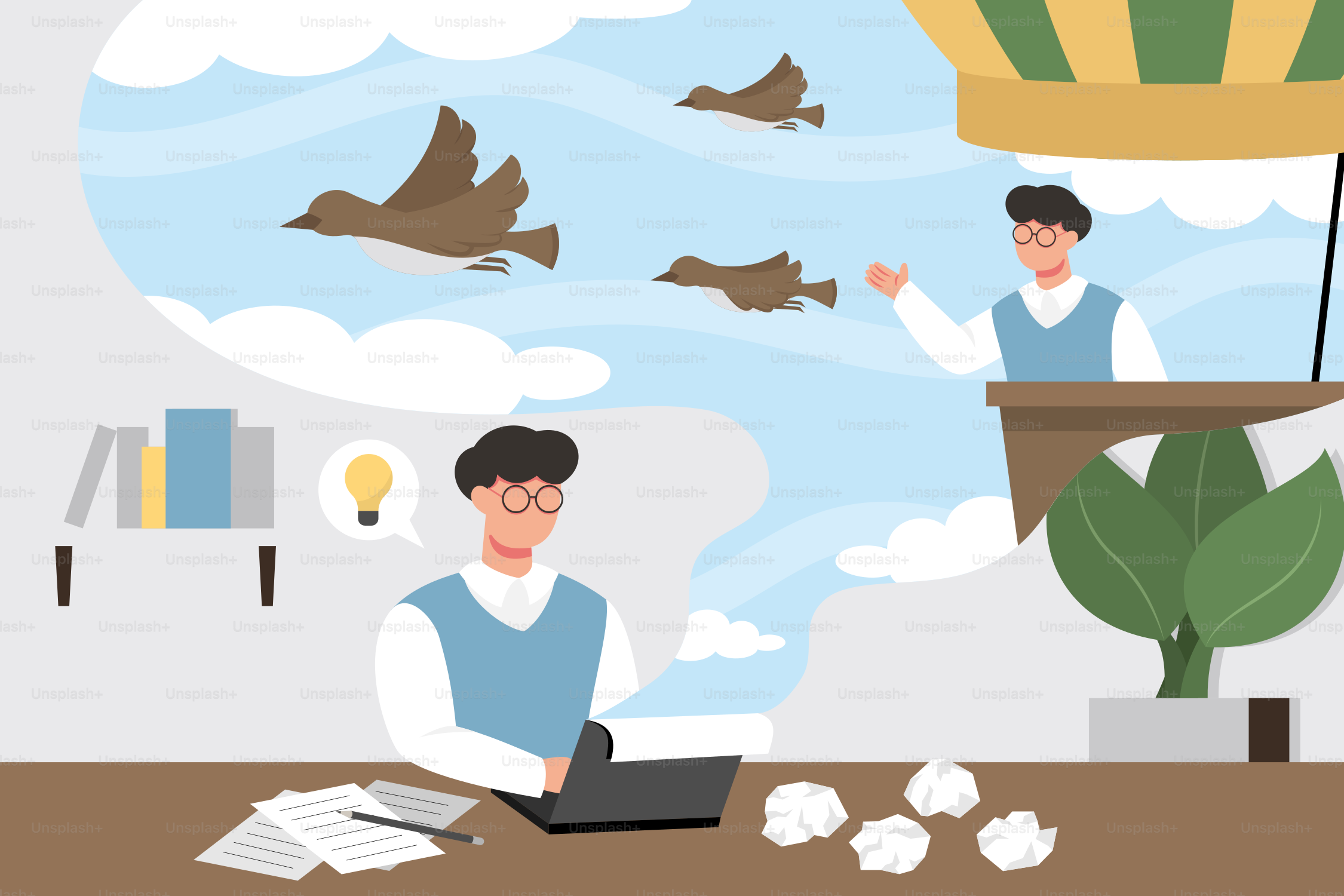 A man sitting at a desk in front of a laptop computer