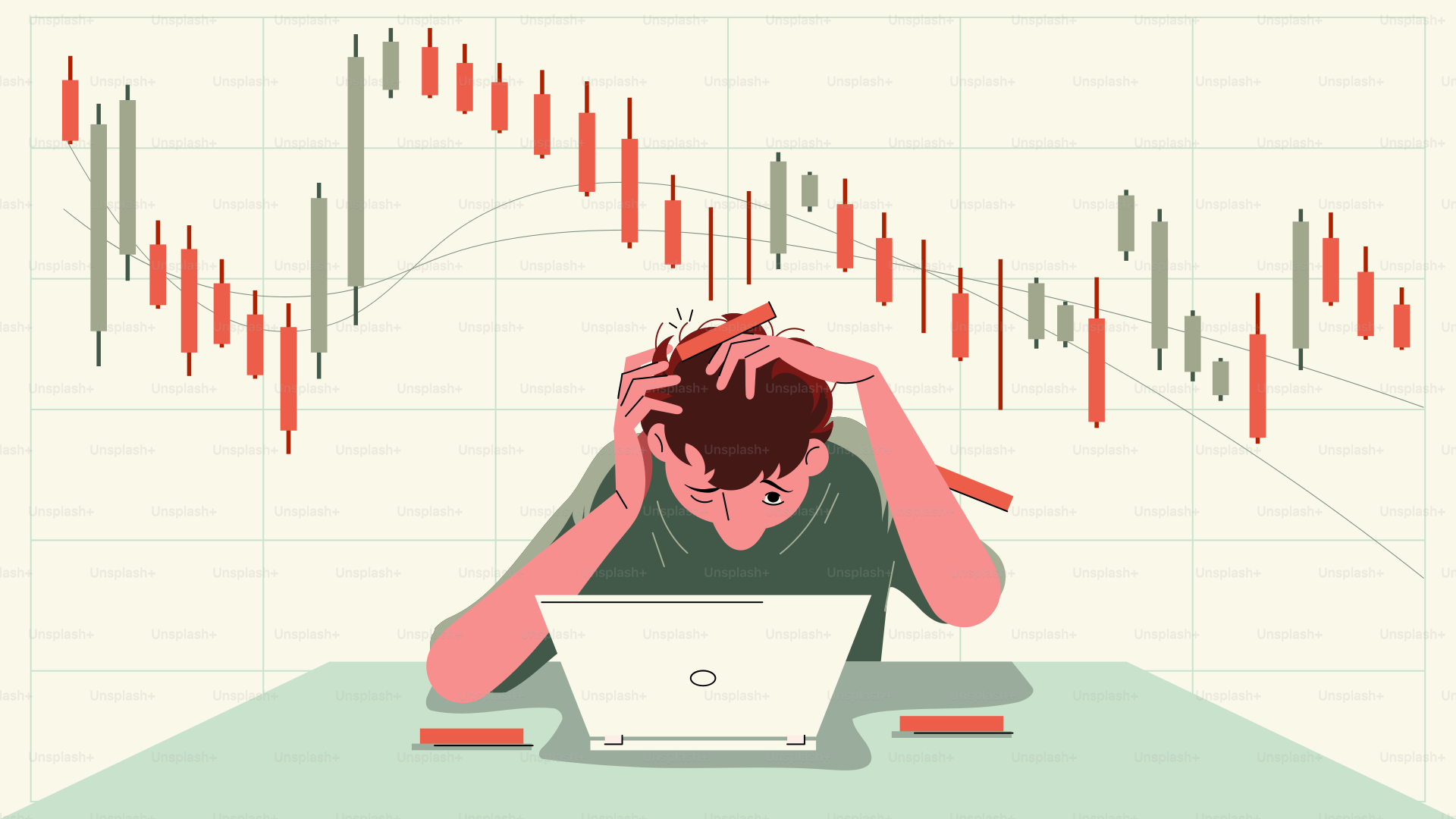 A man sitting in front of a laptop computer