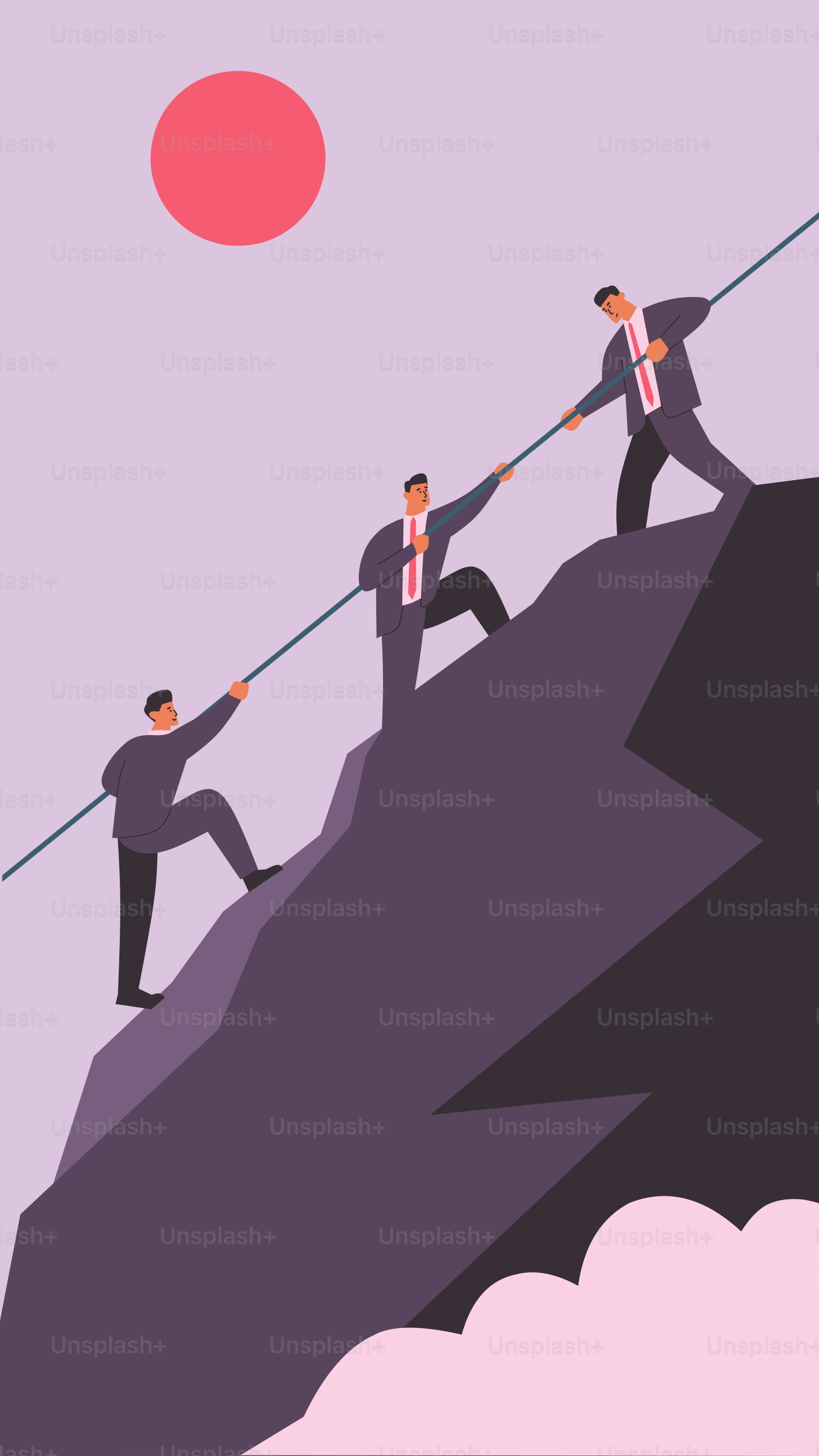 A group of people pulling a rope on top of a mountain