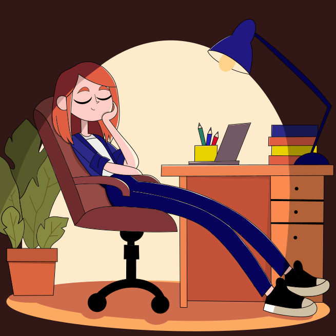 A woman sitting at a desk with a laptop